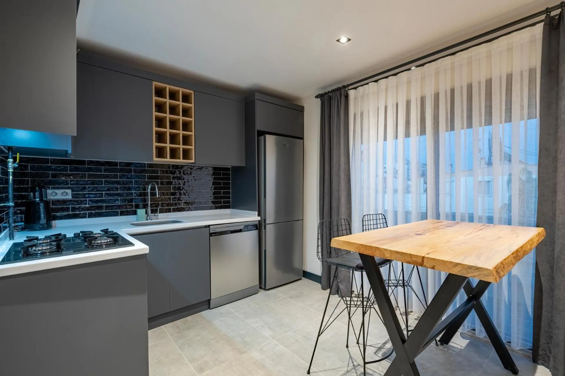 Kitchen or kitchenette in ELUXİO SUİTE HOTEL