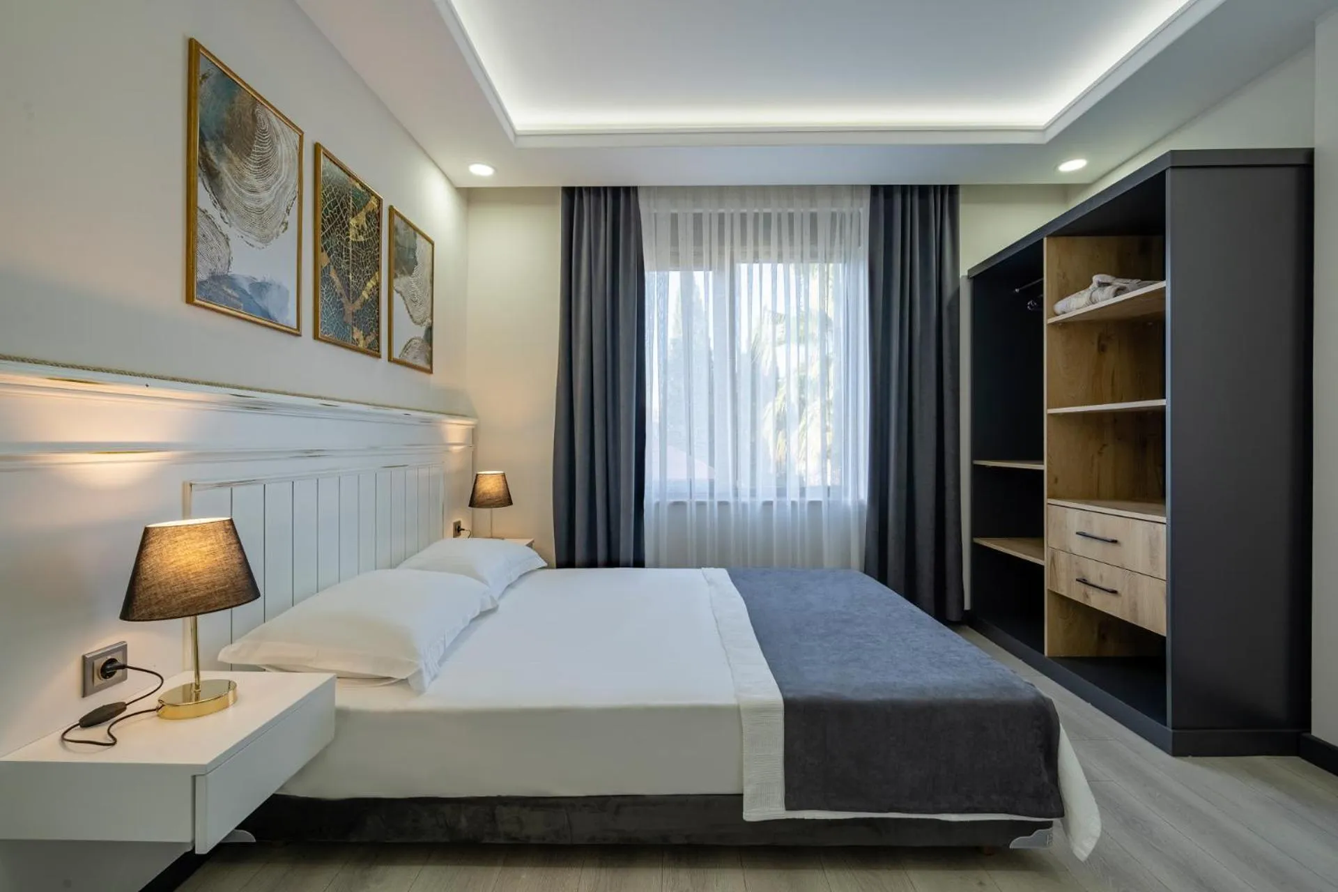 Bed in ELUXİO SUİTE HOTEL