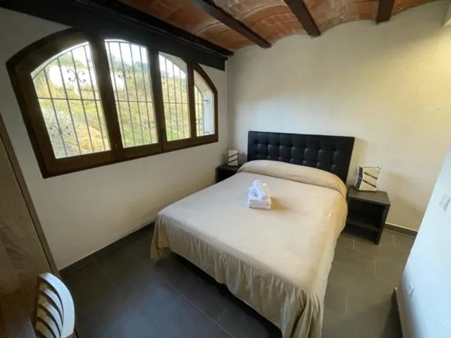 Bed in Hotel Mas Palou