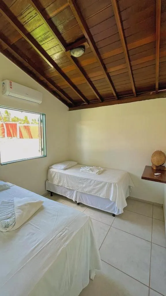 Bed in Pousada Paradise