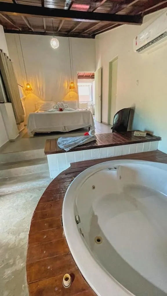 Bed in Pousada Paradise