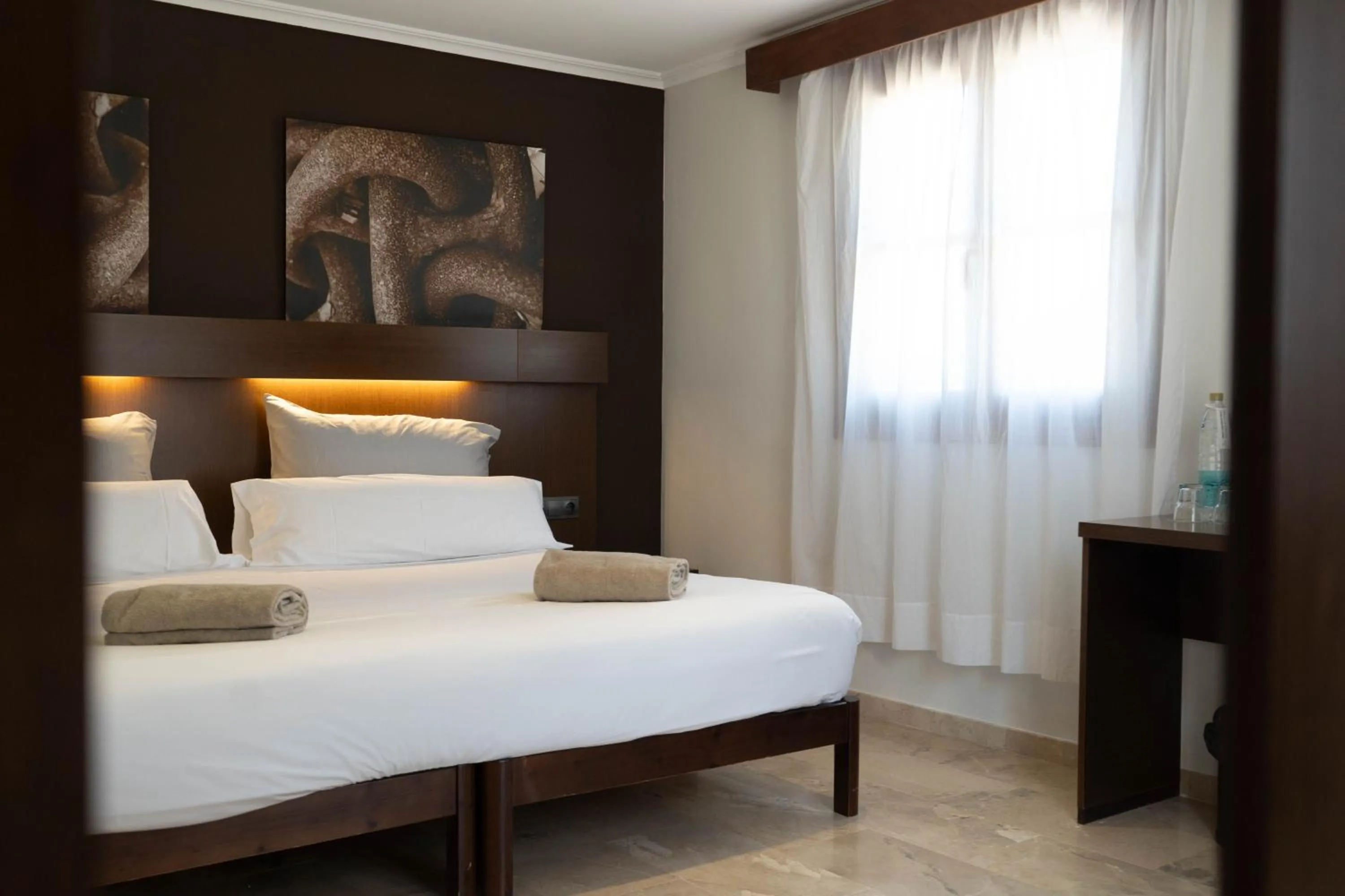 Bed in Maristel Hotel & Spa - Adults Only
