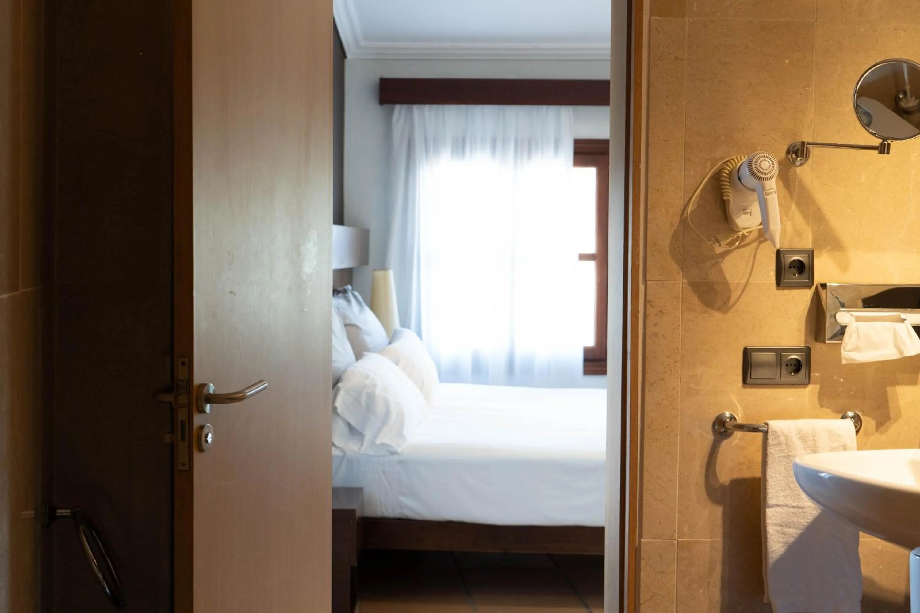 Bathroom, Bed in Maristel Hotel & Spa - Adults Only