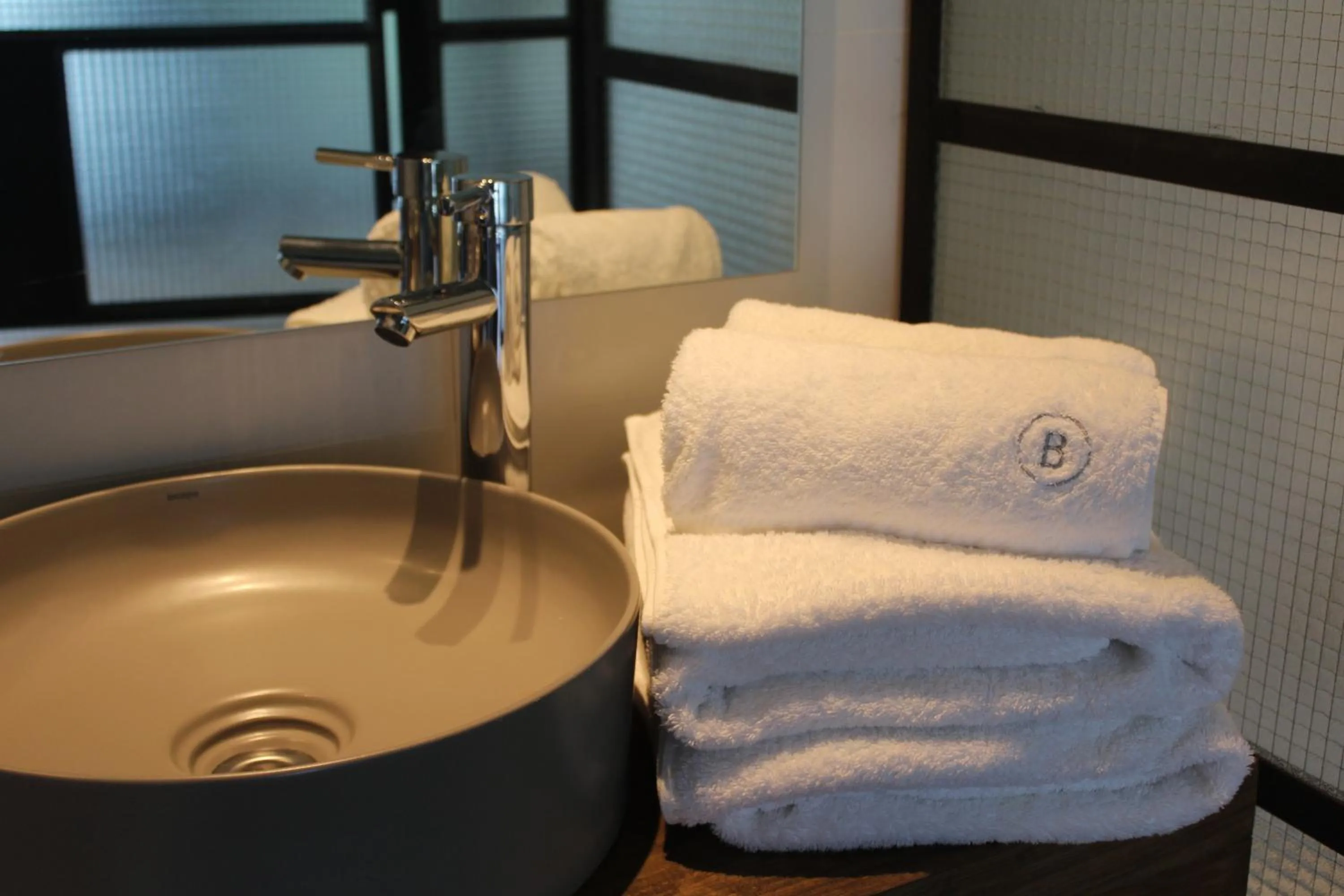 towels in Be House Suites & Spa