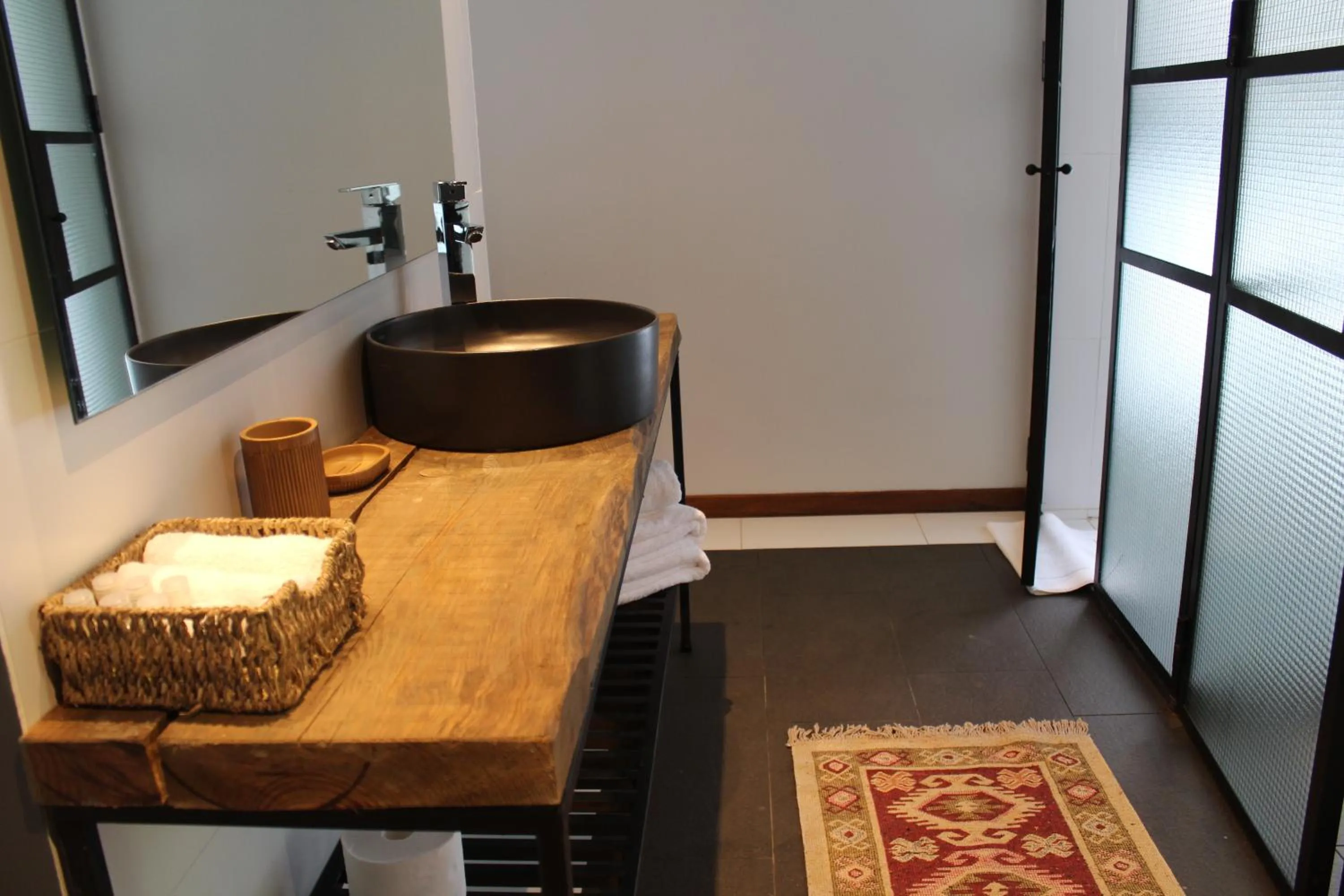 Bathroom in Be House Suites & Spa