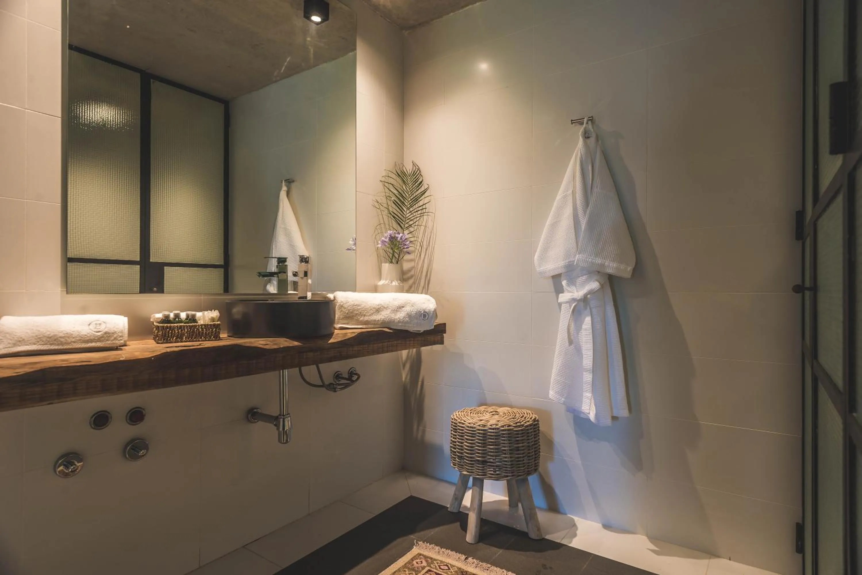 Bathroom in Be House Suites & Spa