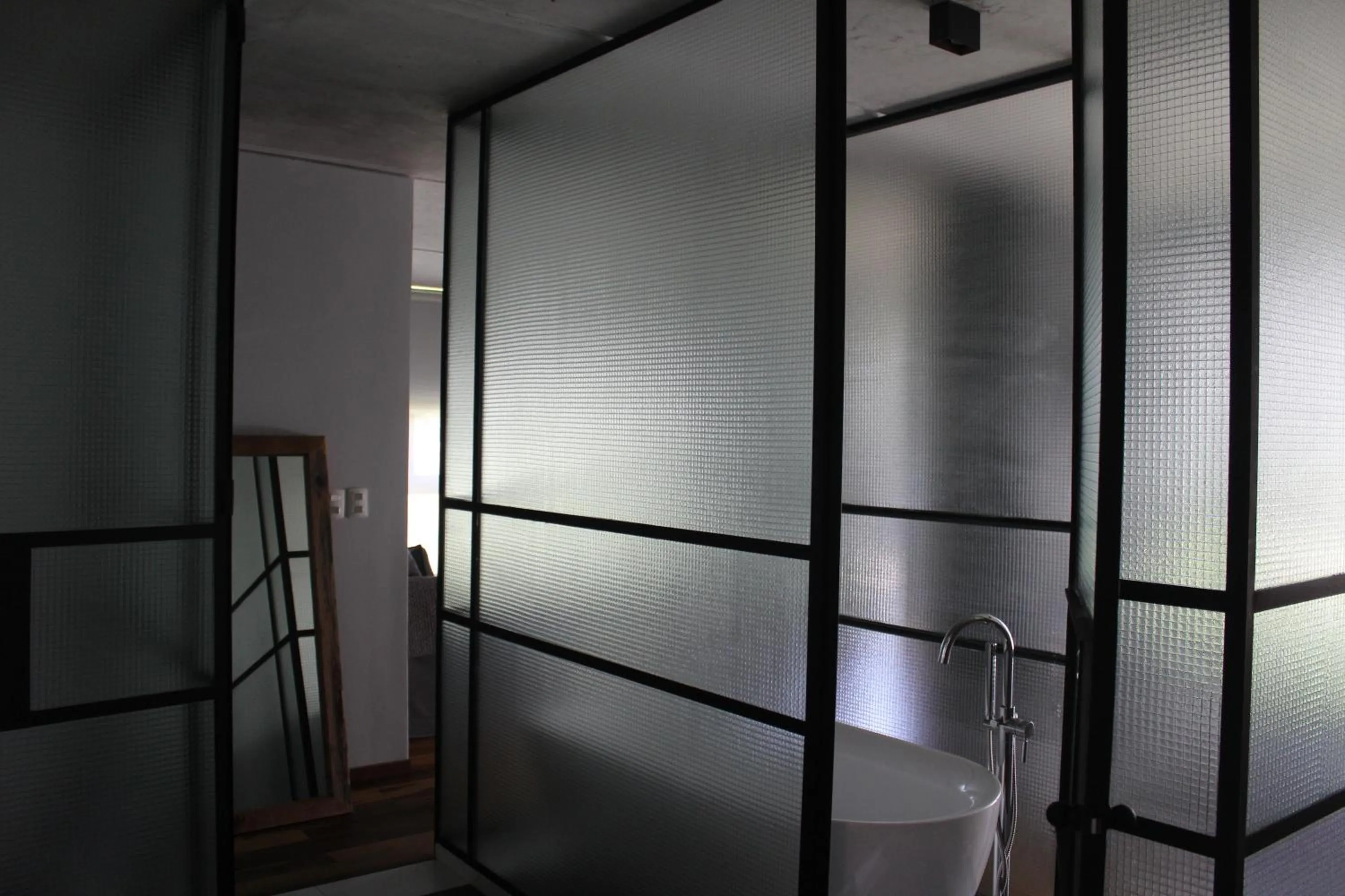Bathroom in Be House Suites & Spa