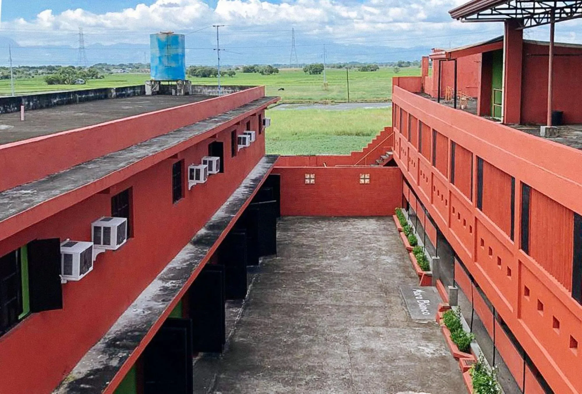 Property building in Maro Bianco's Inn Lubao Pampanga by RedDoorz