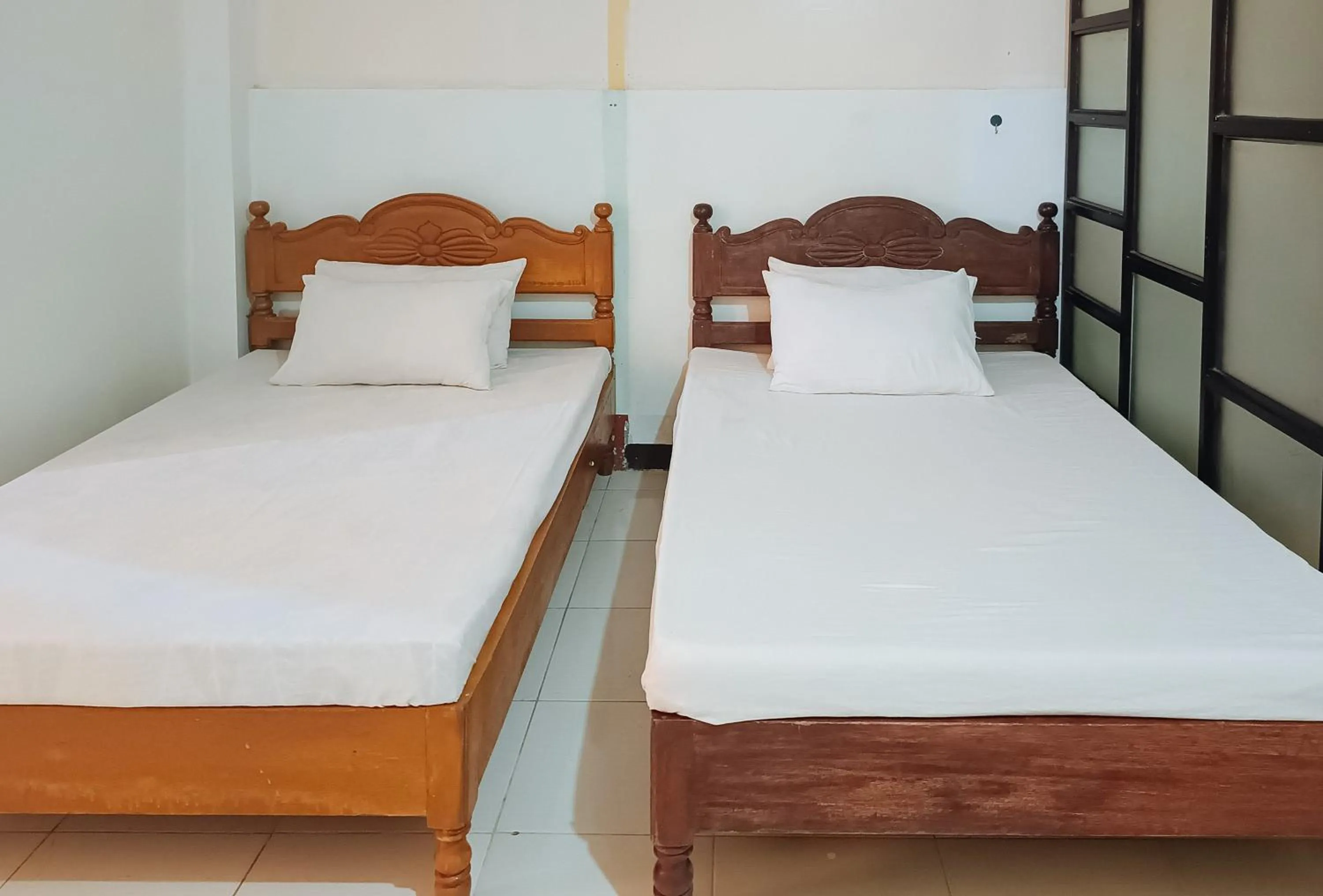 Bed in RedDoorz @ Grand Valley Hotel Junction Luna Cagayan