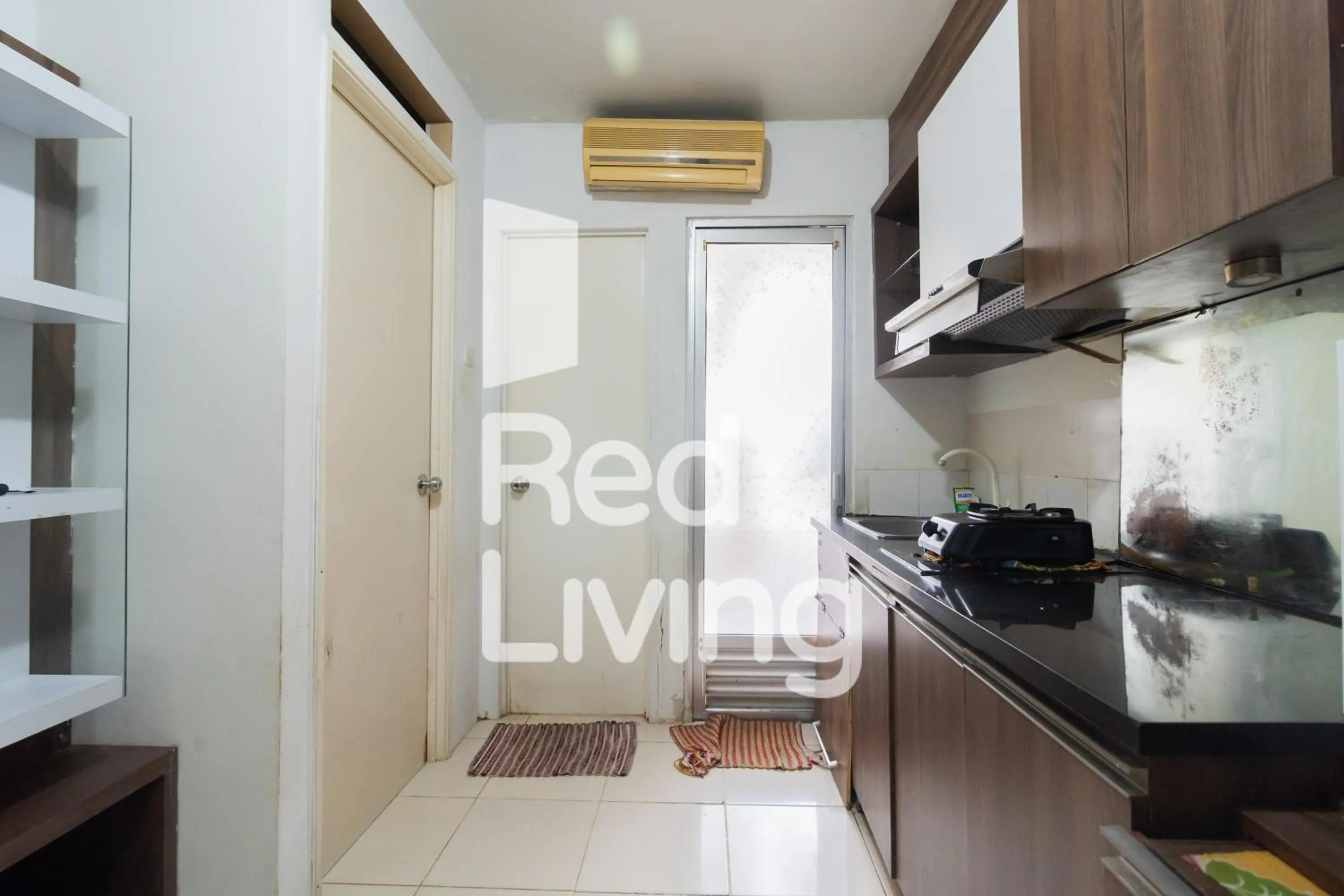 Kitchen or kitchenette in RedLiving Apartemen Kalibata City - SAG Property Tower Kemuning