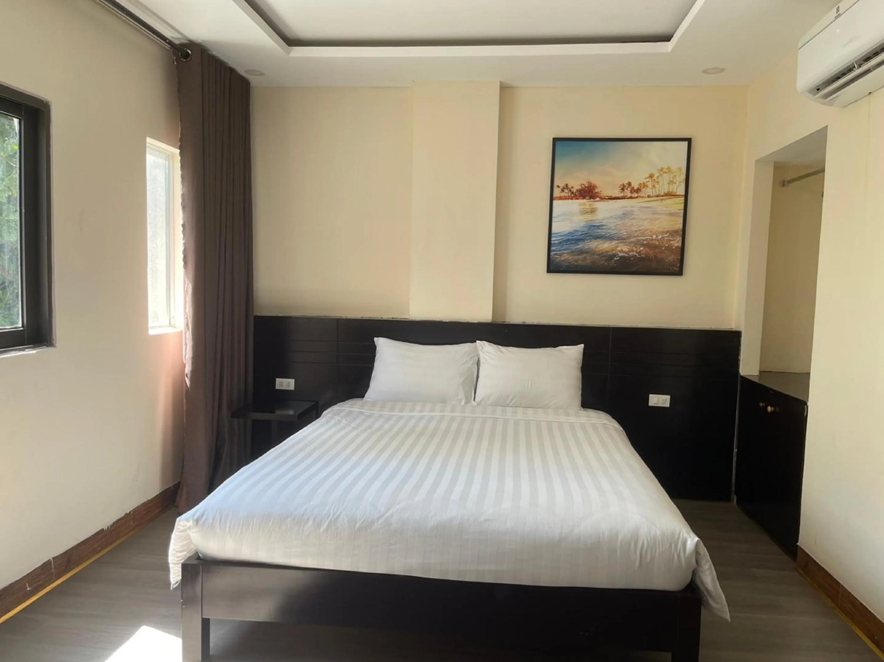 Bed in NALINI Hotel & Apartment