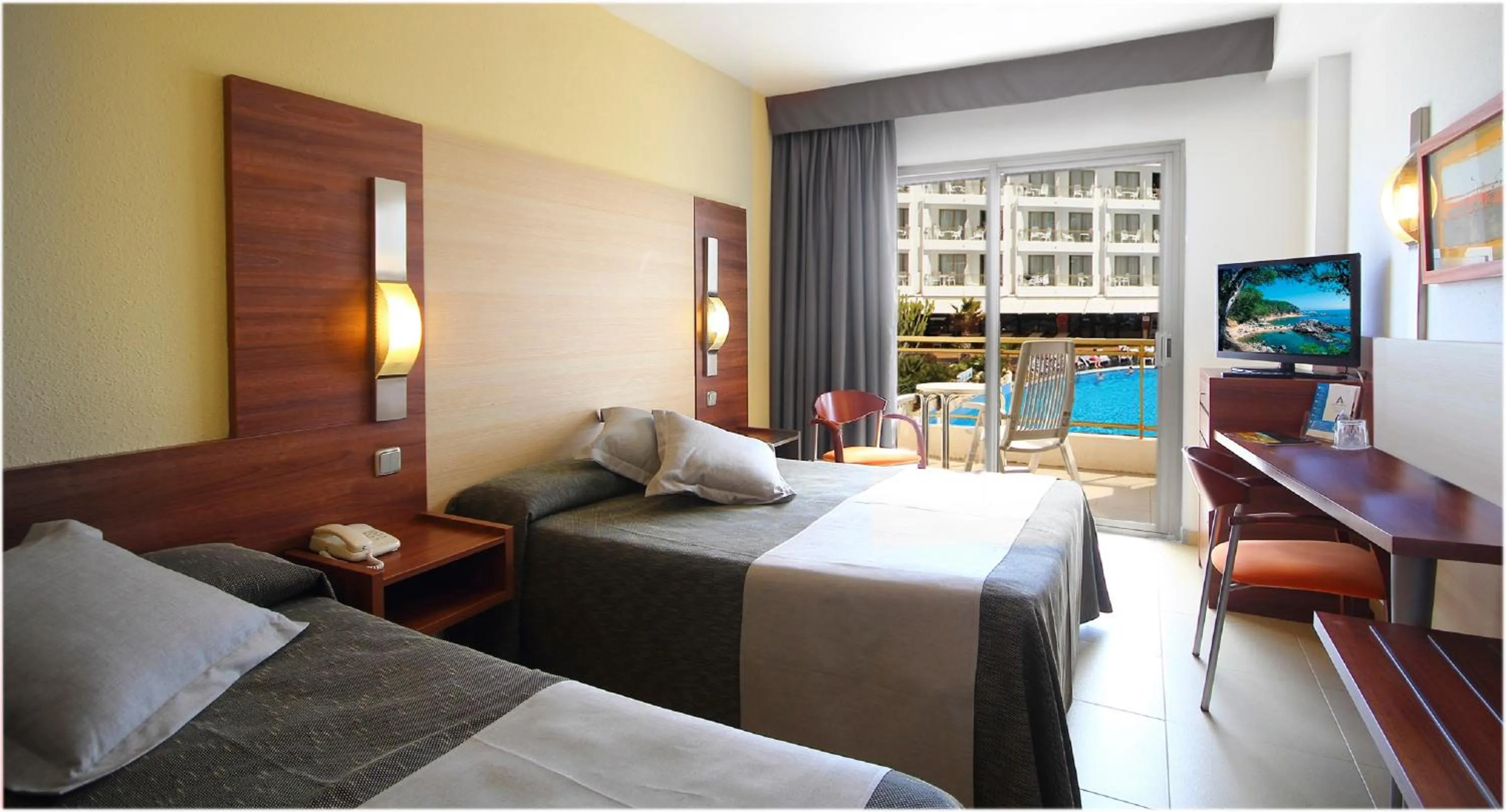 Photo of the whole room, Bed in AQUA Hotel Aquamarina & Spa