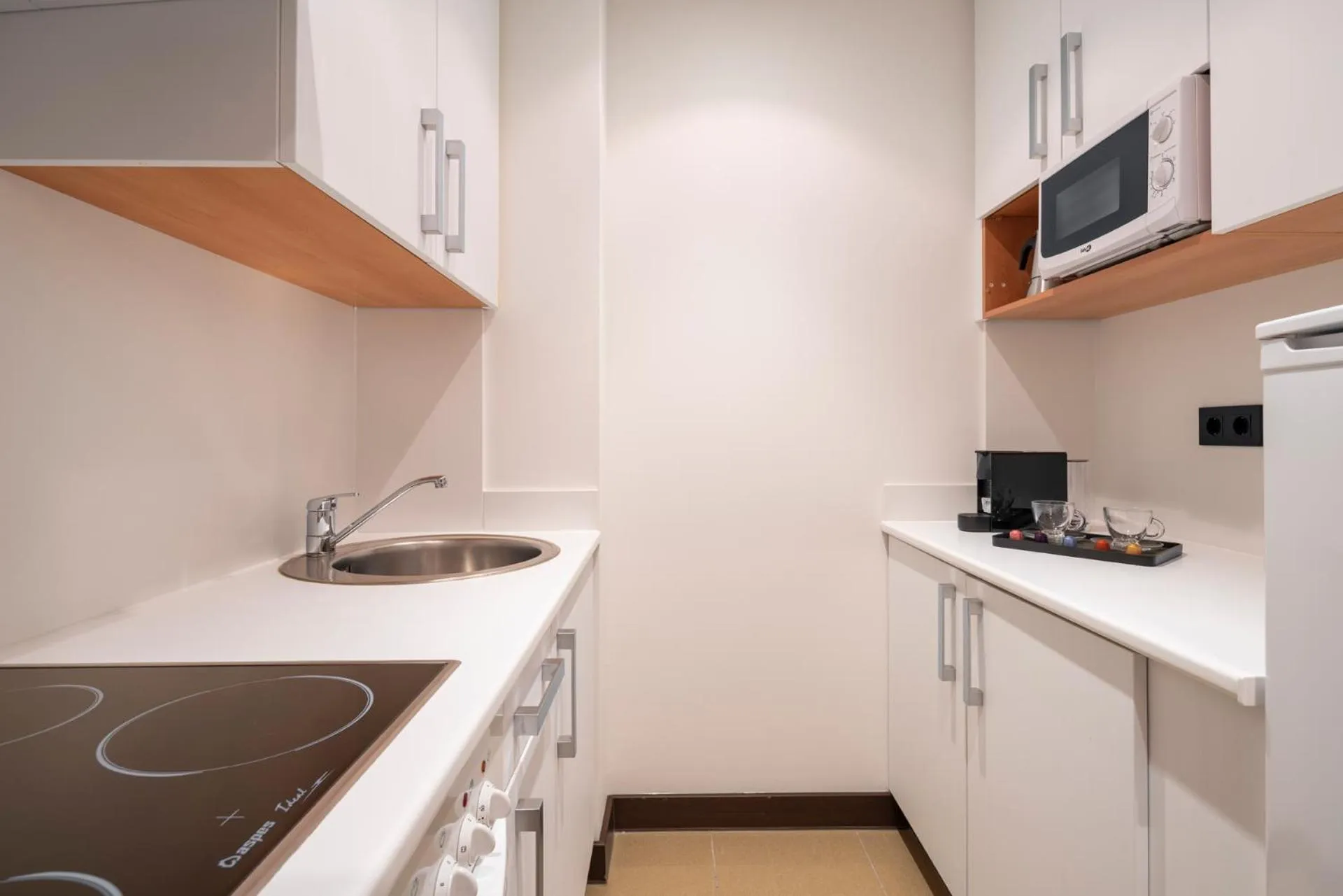 Kitchen or kitchenette in Aparthotel Attica21 As Galeras