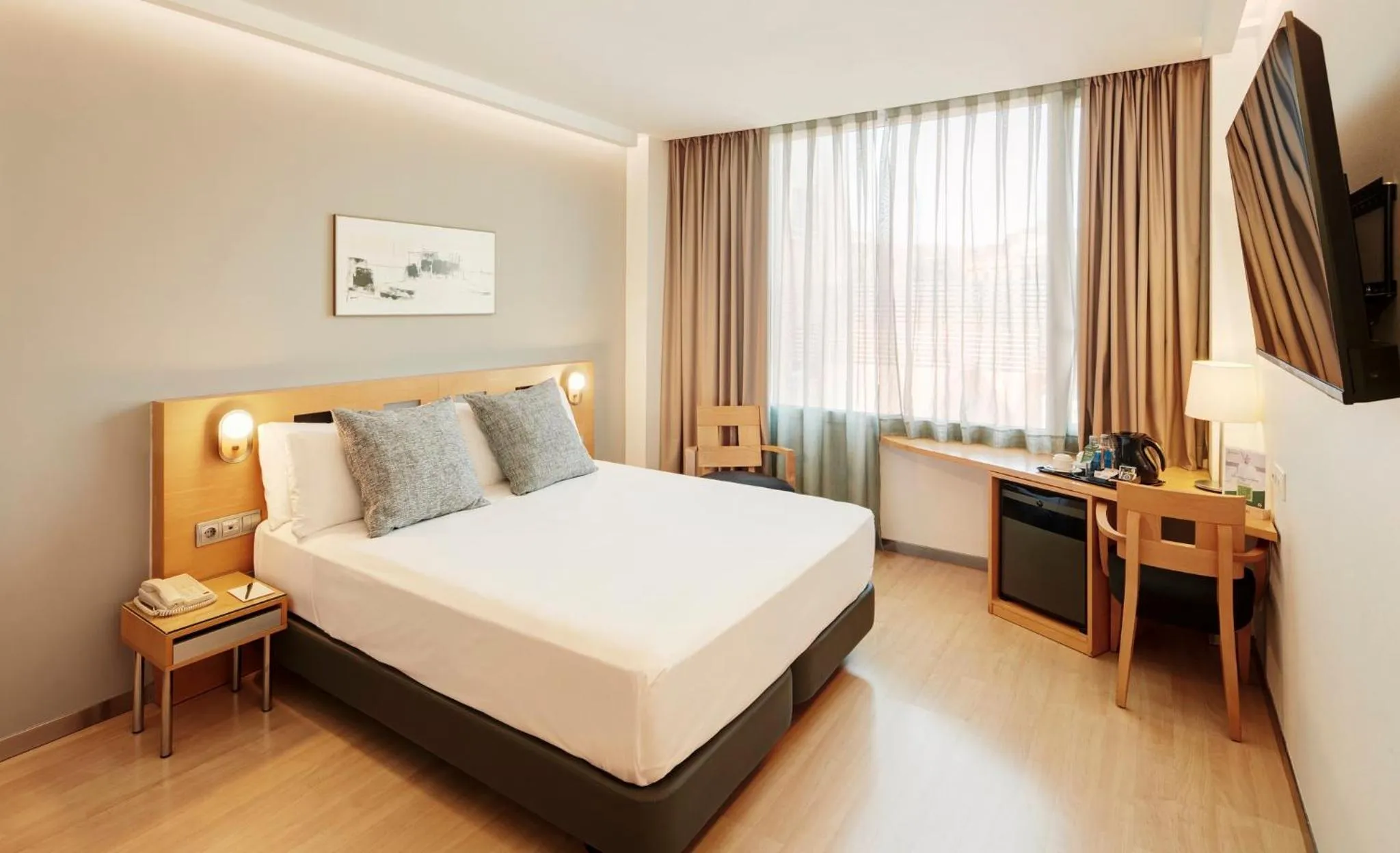 Photo of the whole room, Bed in Sercotel Caspe