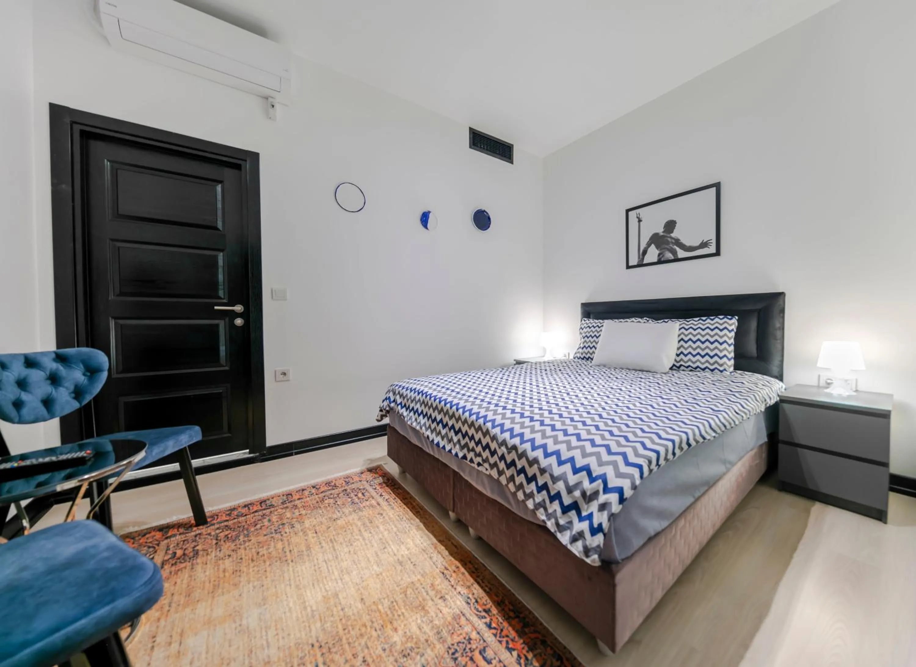 Bed in Hexa Suites Hotel