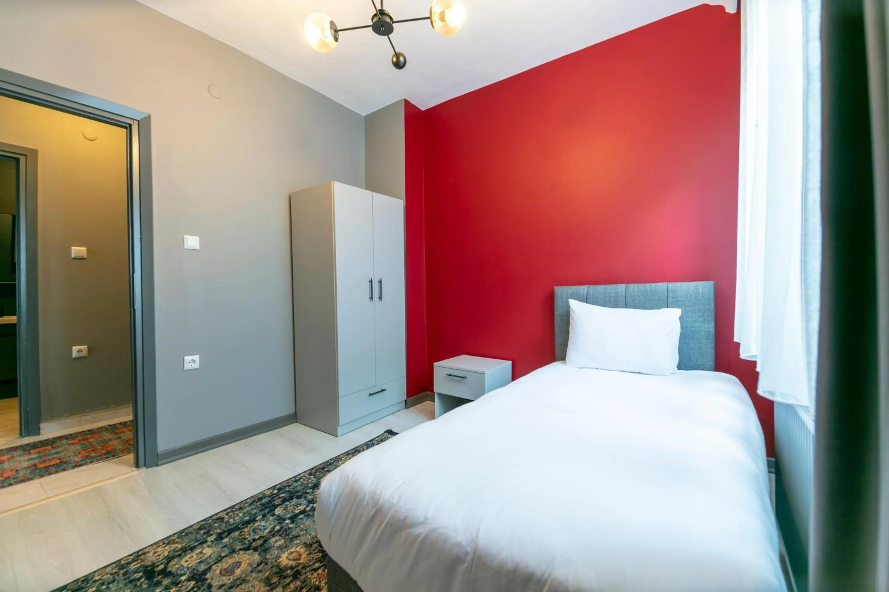 Bed in Hexa Suites Hotel