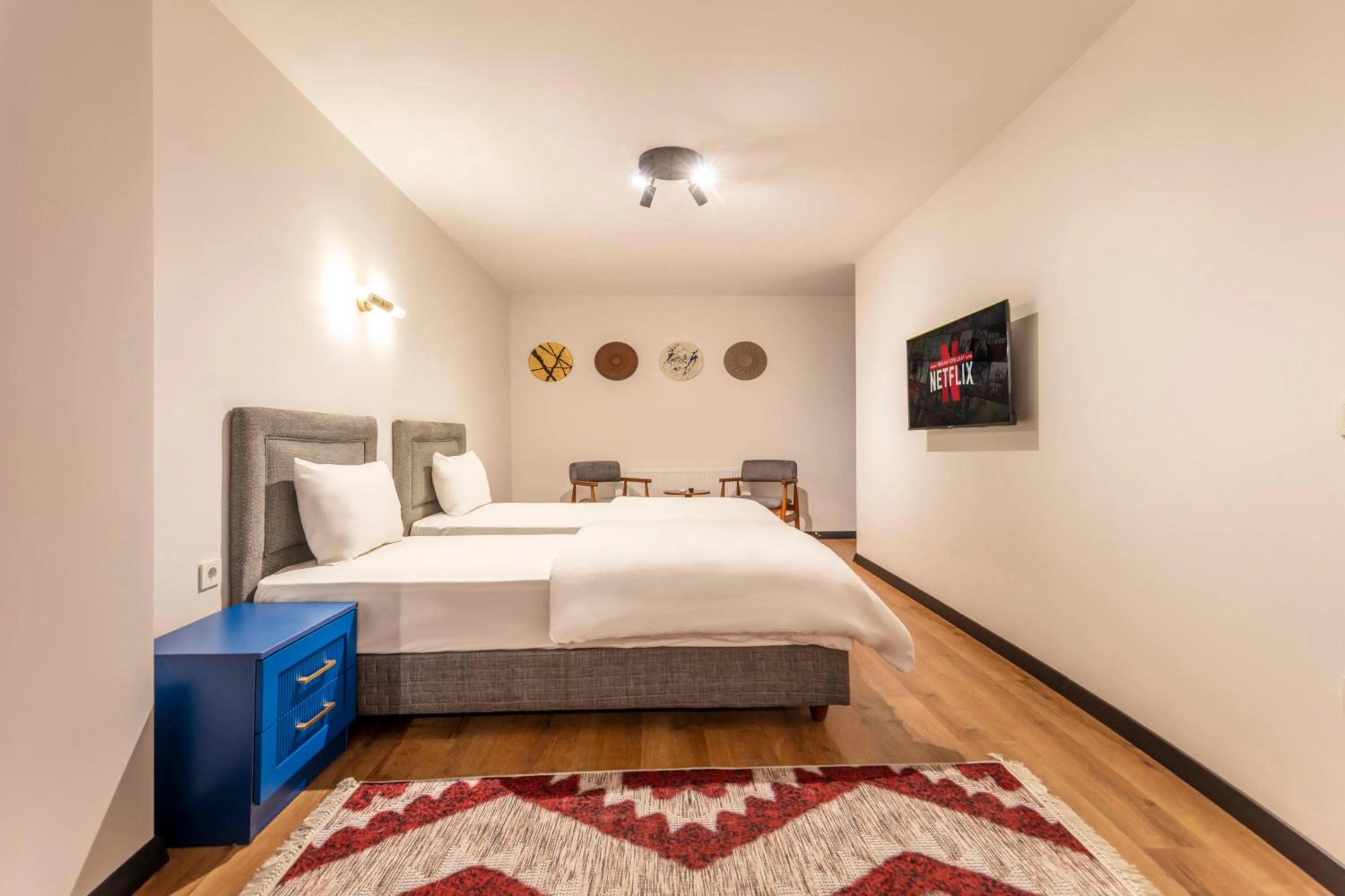 Bed in Hexa Suites Hotel