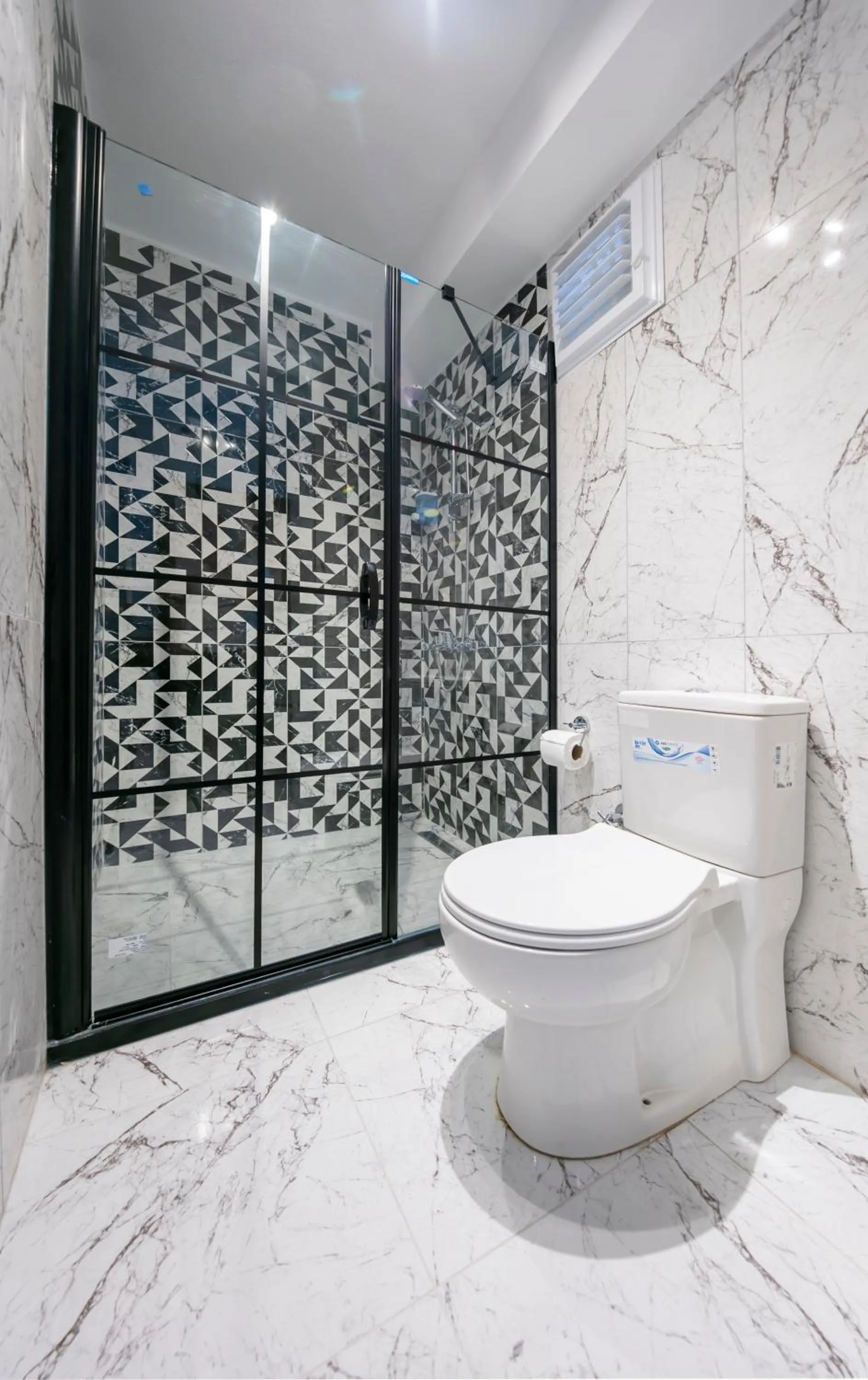 Toilet in Hexa Suites Hotel