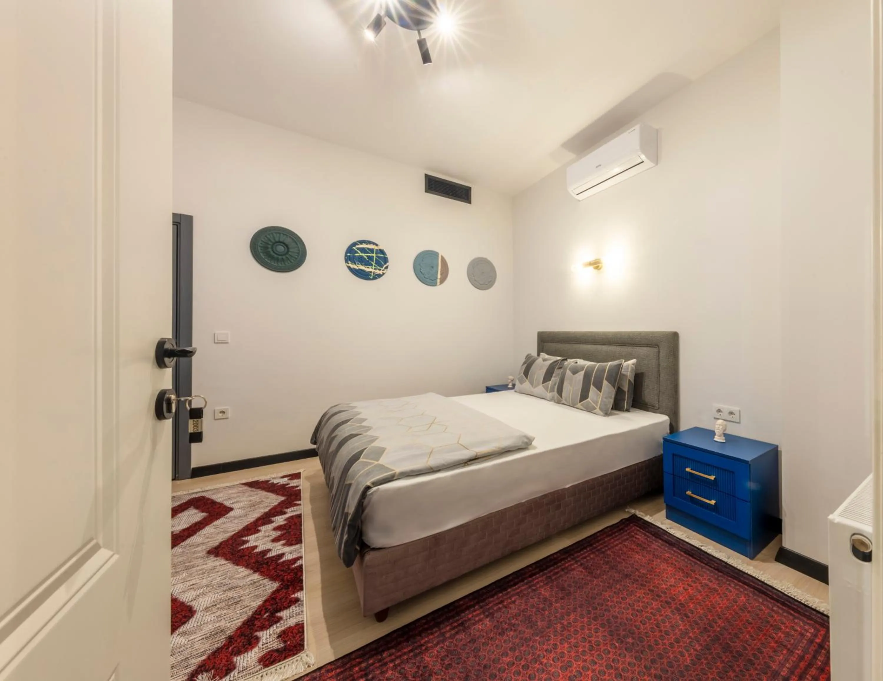 Bed in Hexa Suites Hotel