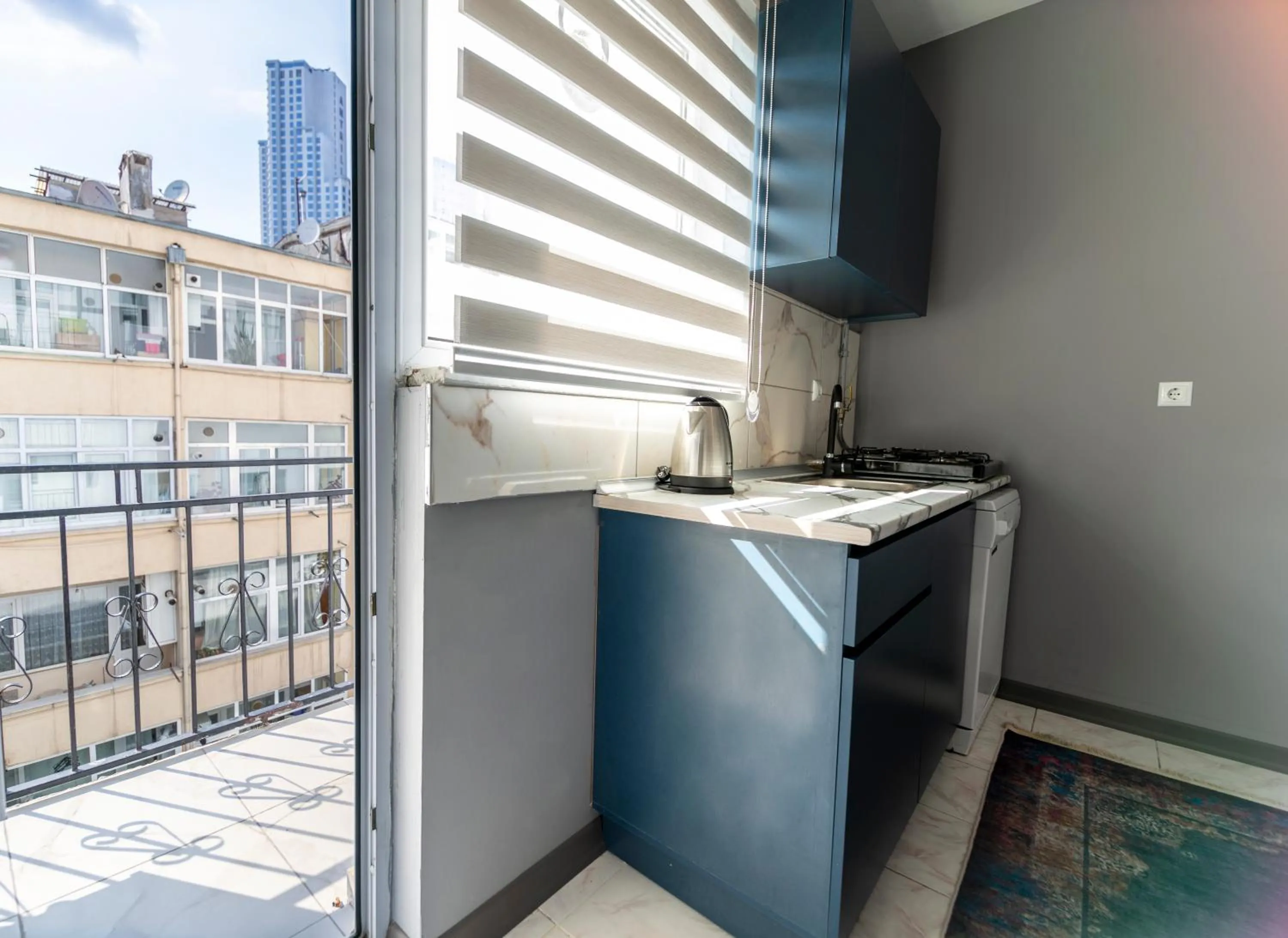 kitchen in Hexa Suites Hotel