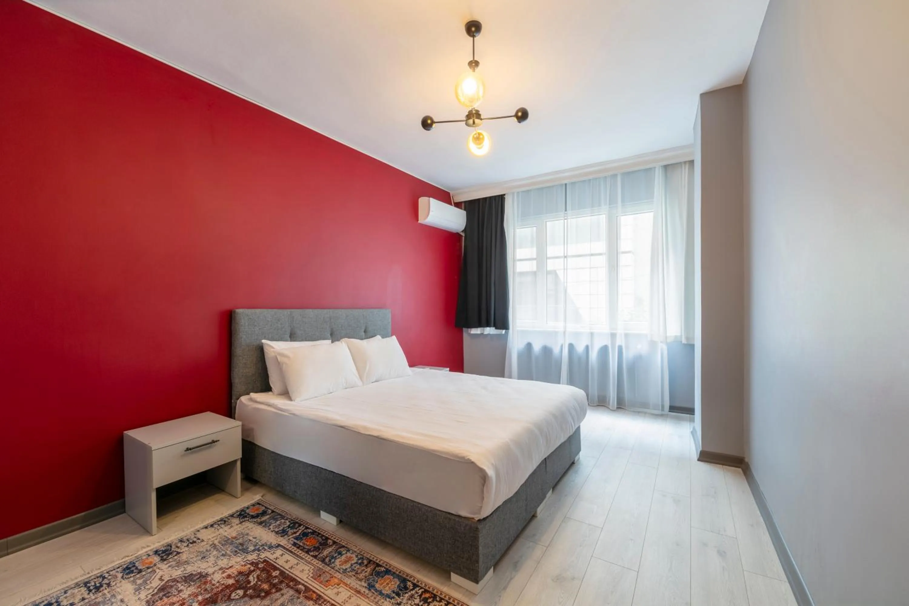 Bed in Hexa Suites Hotel