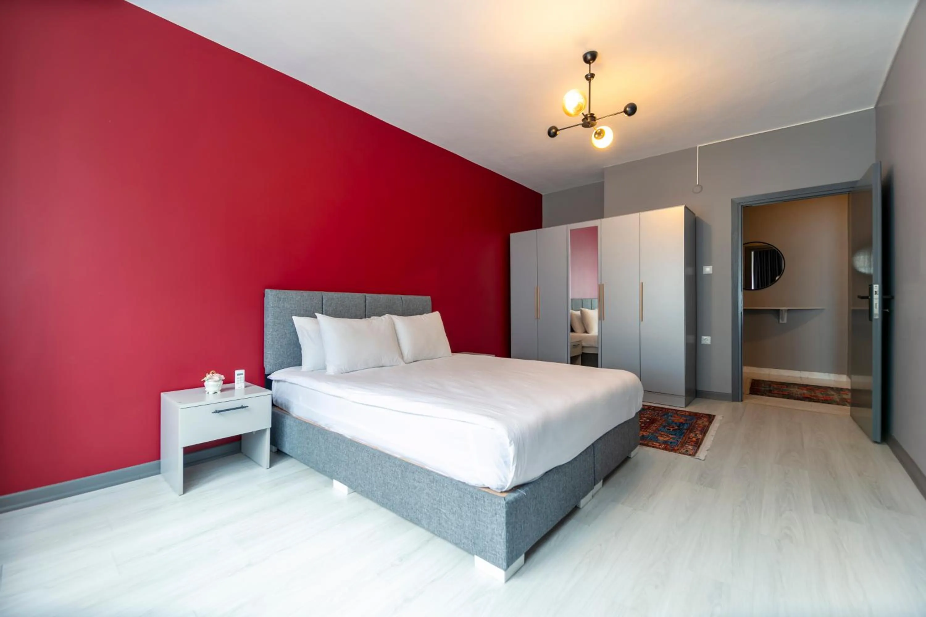 Bed in Hexa Suites Hotel