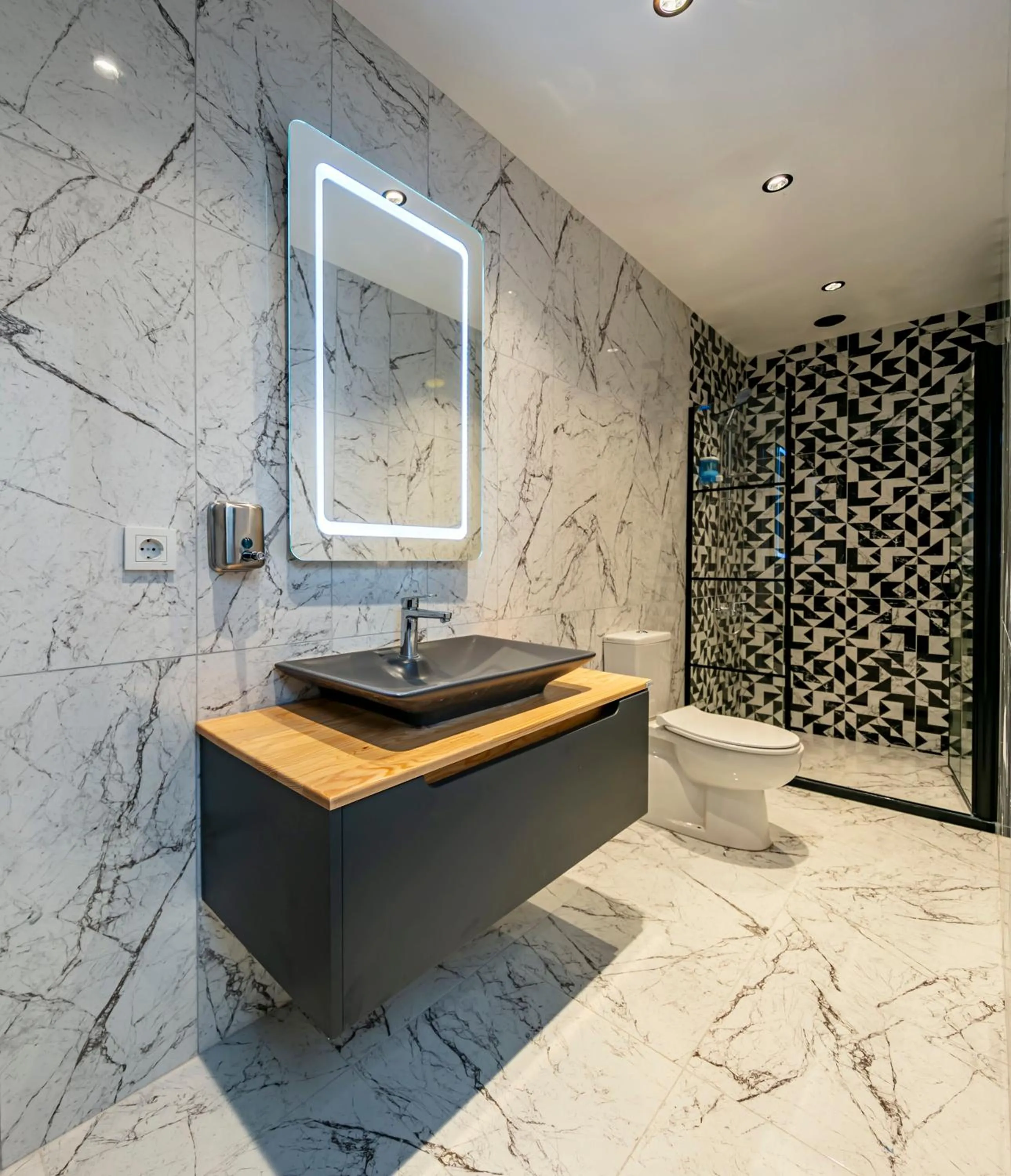 Toilet in Hexa Suites Hotel