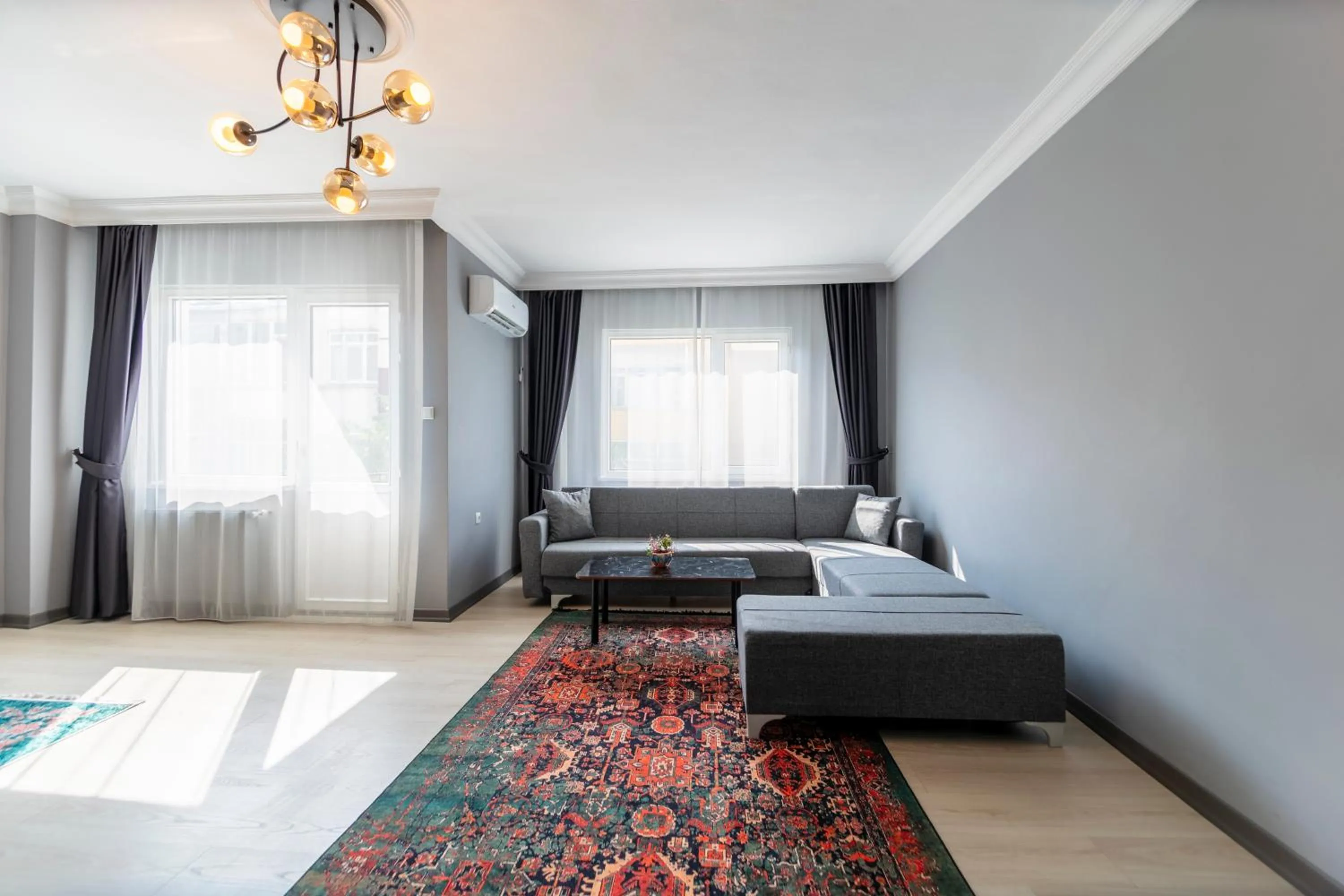 Living room, Bed in Hexa Suites Hotel