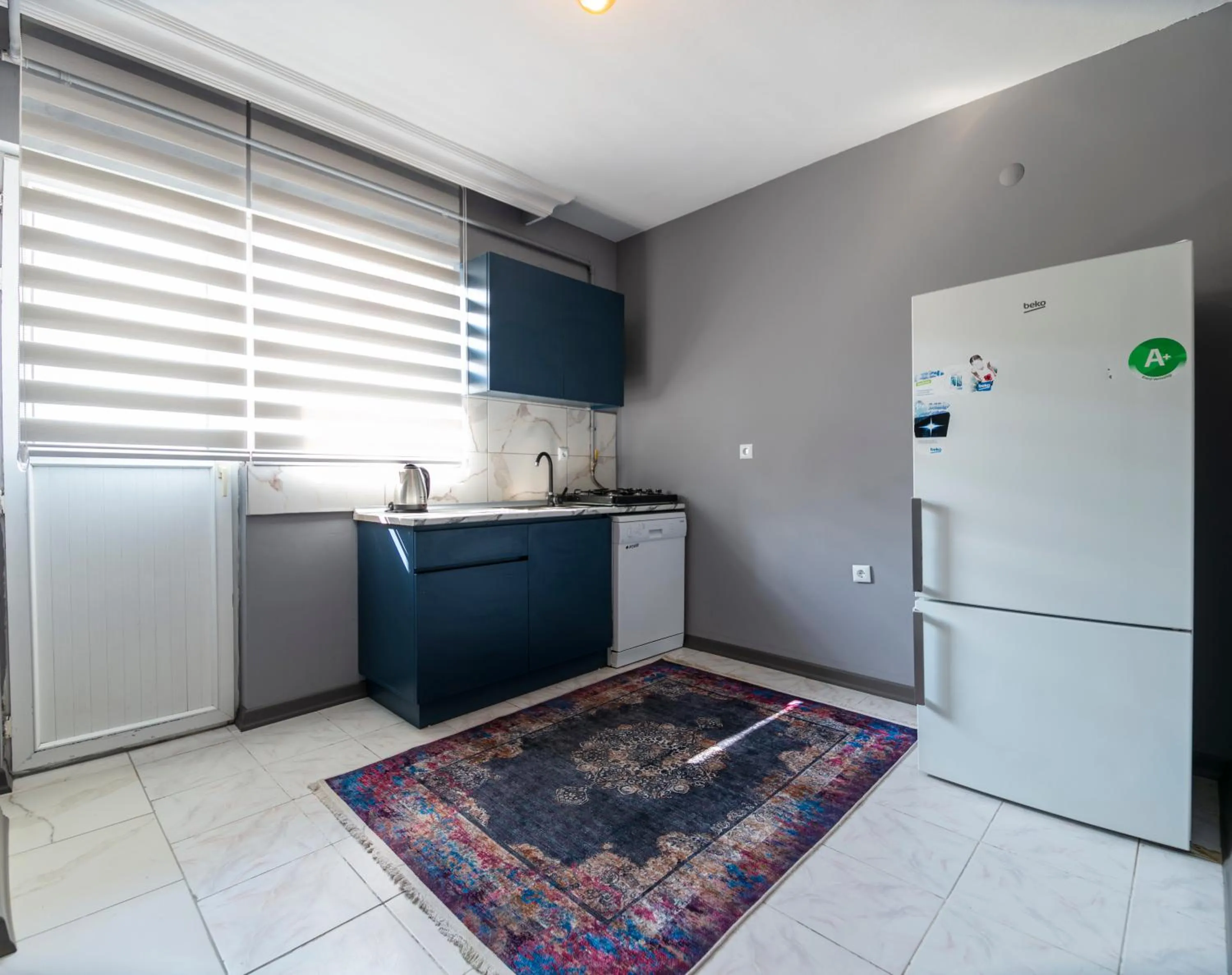 Kitchen or kitchenette in Hexa Suites Hotel