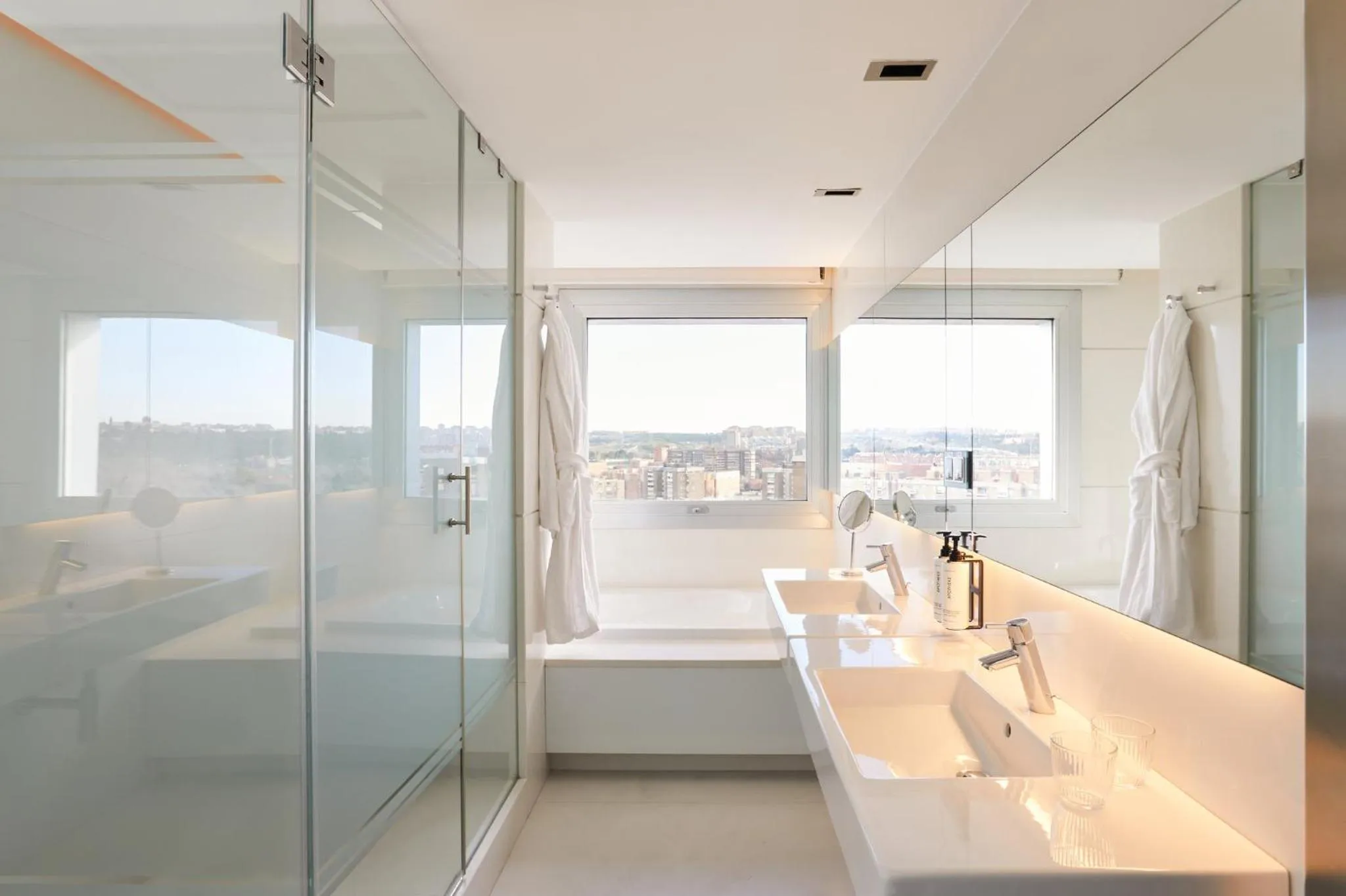 Bathroom in voco Madrid Retiro by IHG