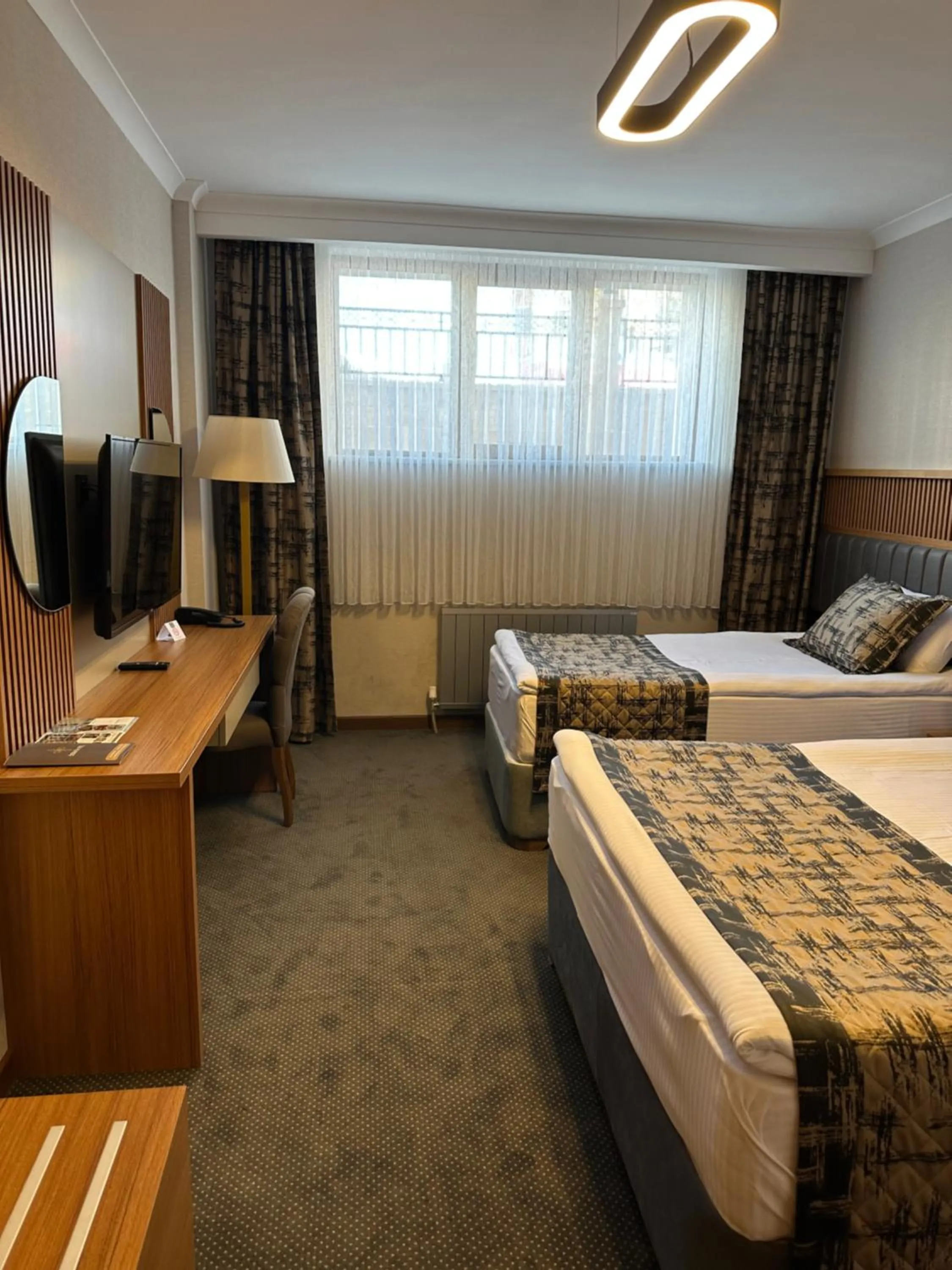 Seating area, Bed in Özkaya hotel