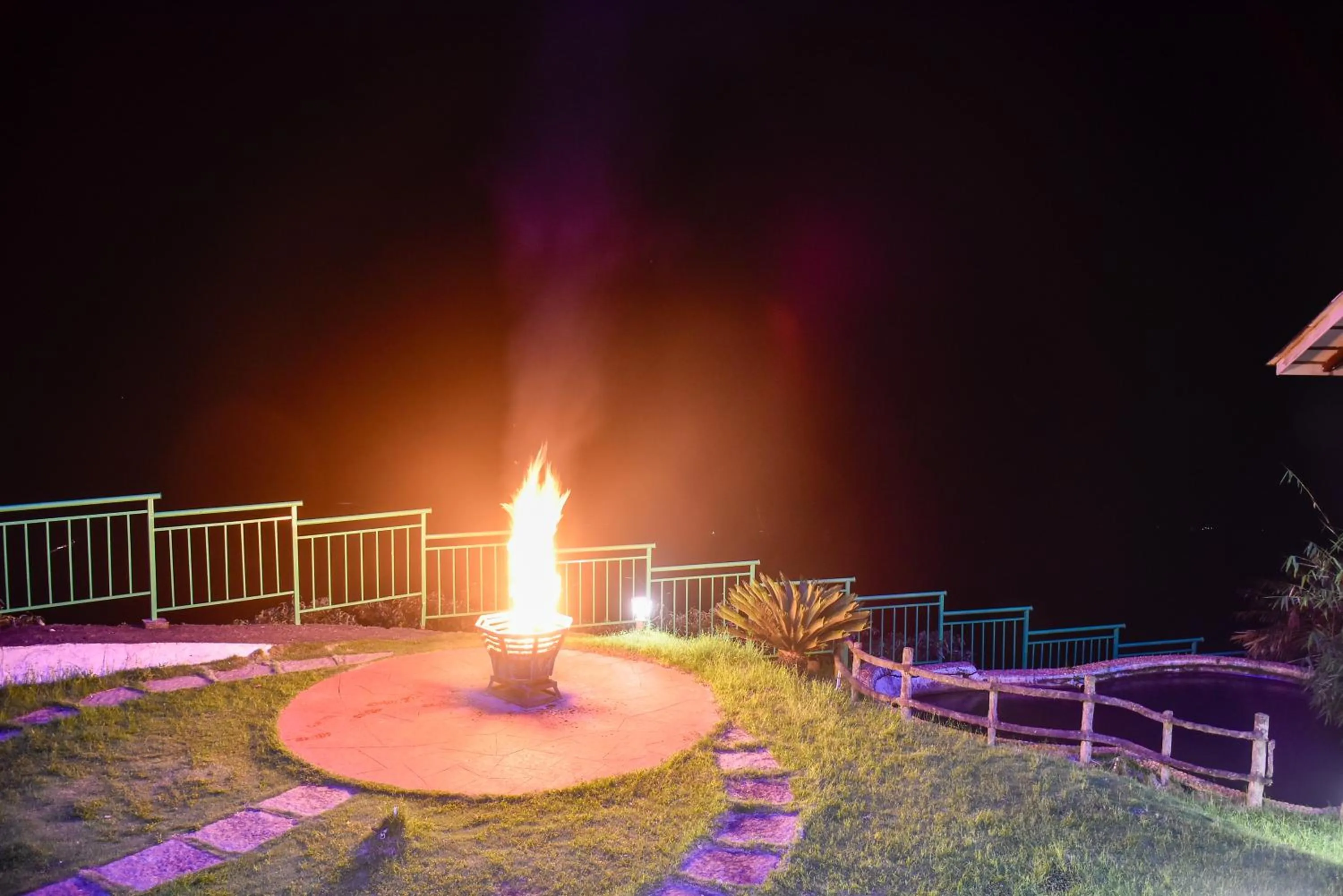 fireplace in Chill Berg Resort - Bodimettu