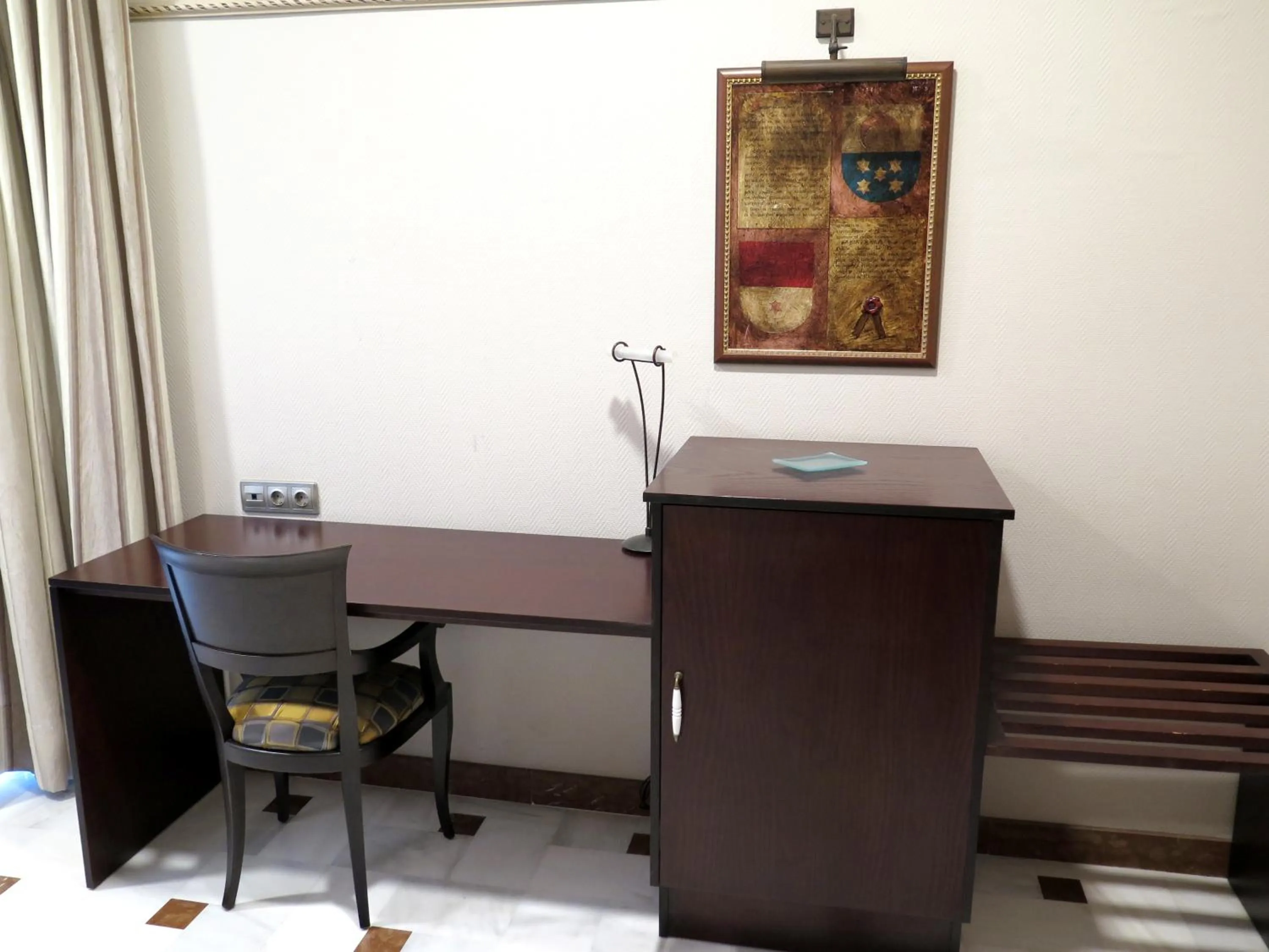 Seating area in Hotel Don Miguel Plaza