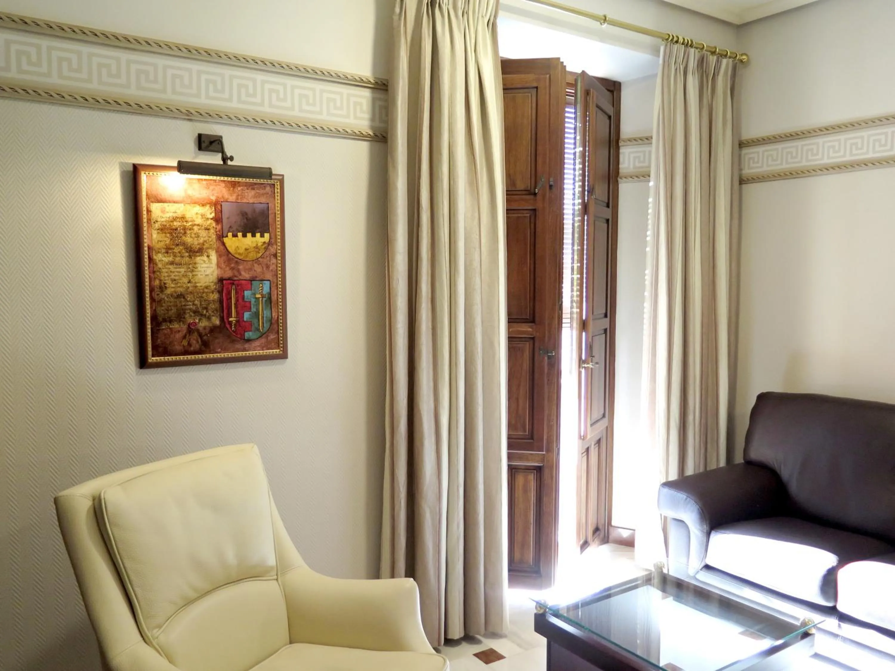 Living room in Hotel Don Miguel Plaza