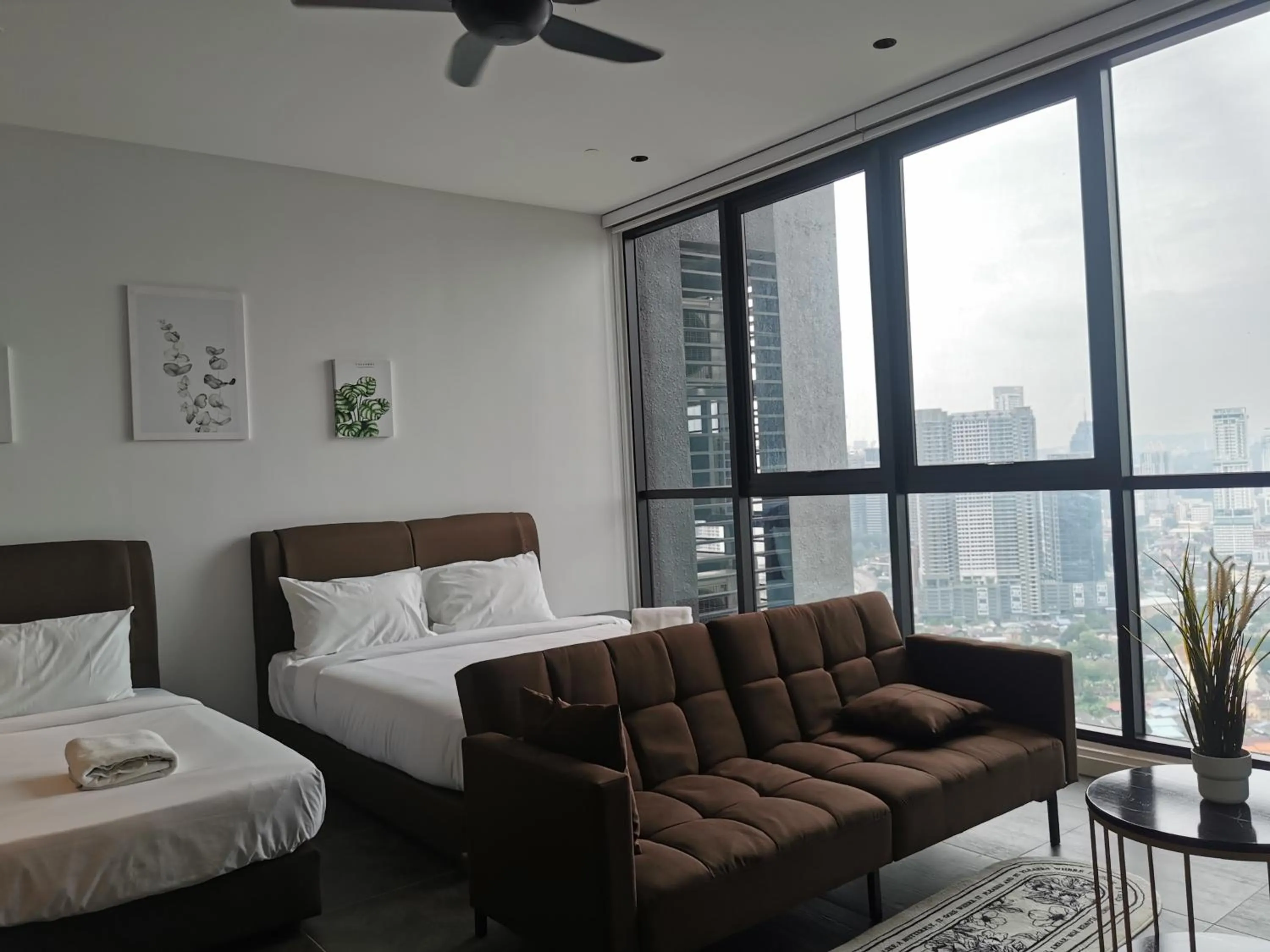 Bed in Scarletz Suites KLCC by De Harlequins Guesthouse