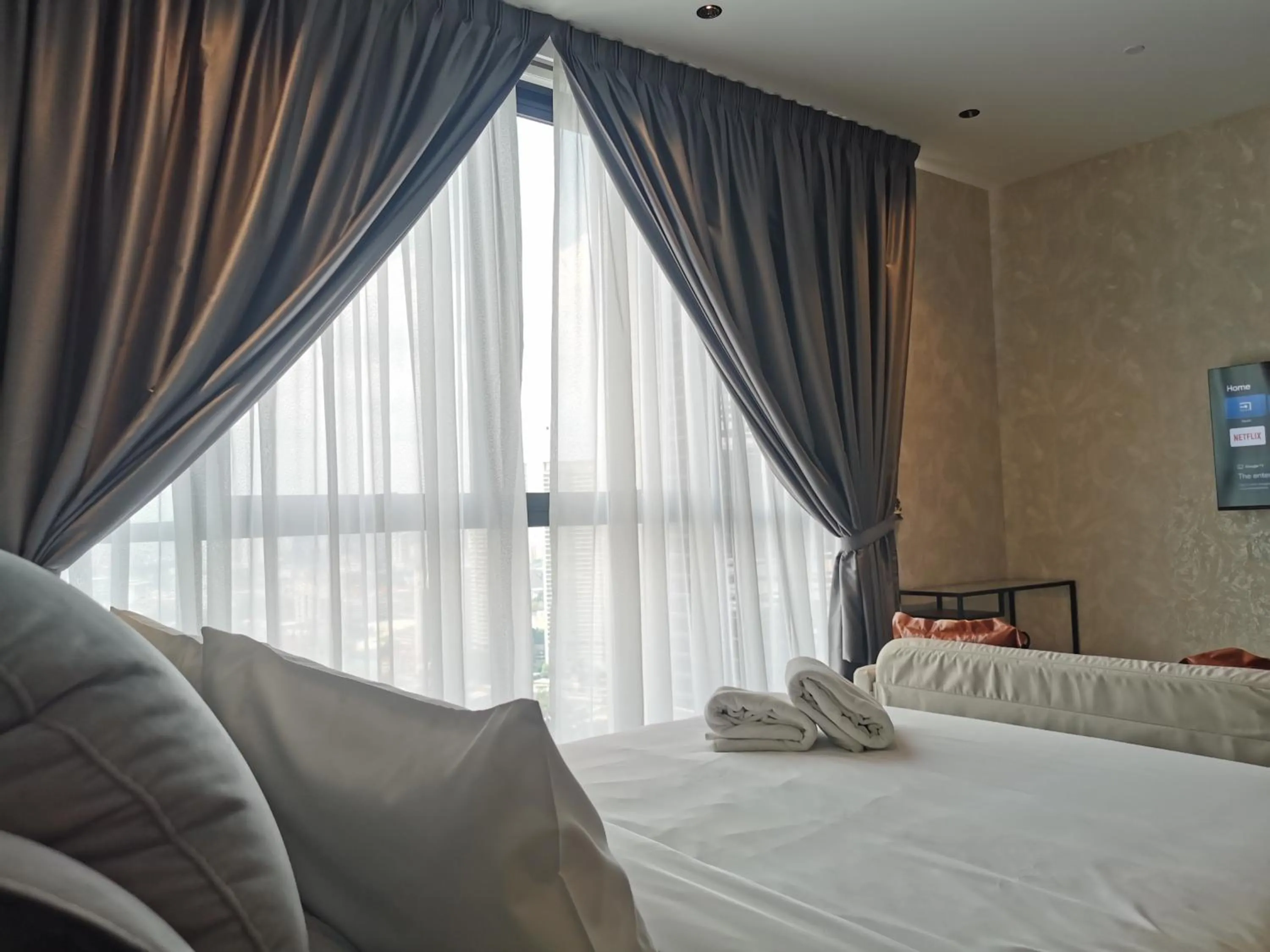 Bed in Scarletz Suites KLCC by De Harlequins Guesthouse