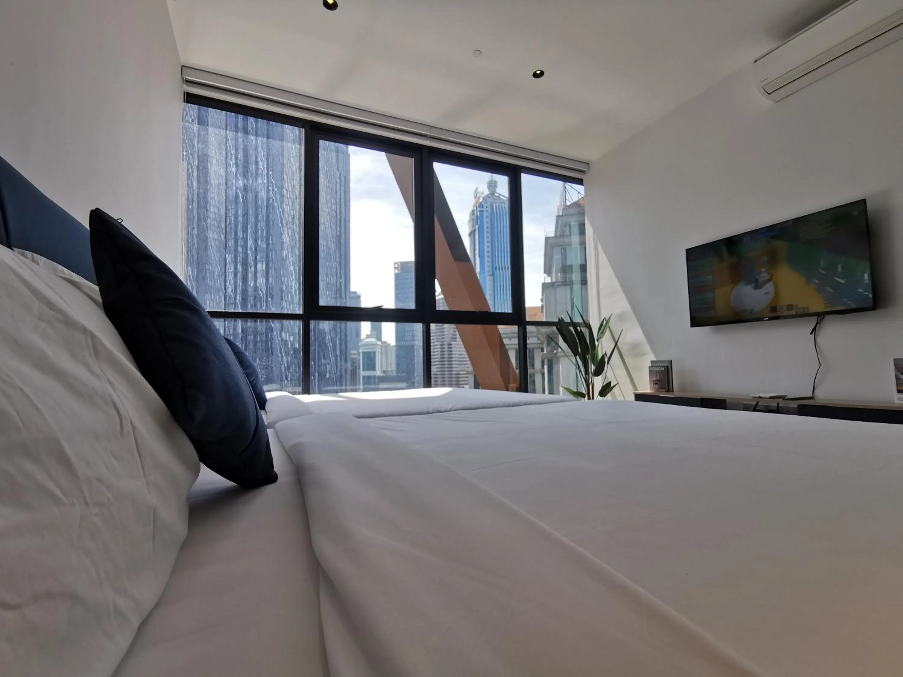 Bed in Scarletz Suites KLCC by De Harlequins Guesthouse