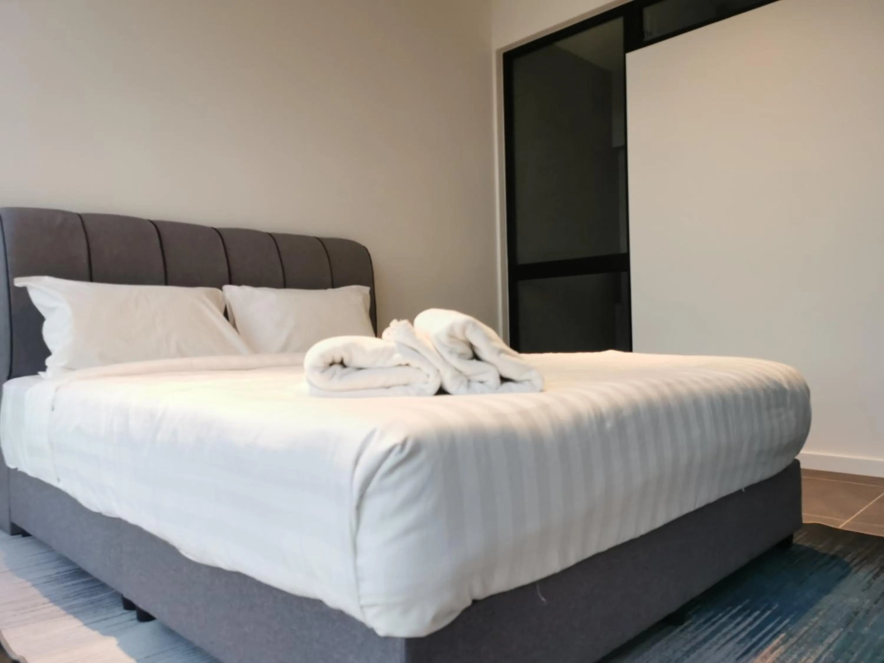 Bed in Scarletz Suites KLCC by De Harlequins Guesthouse