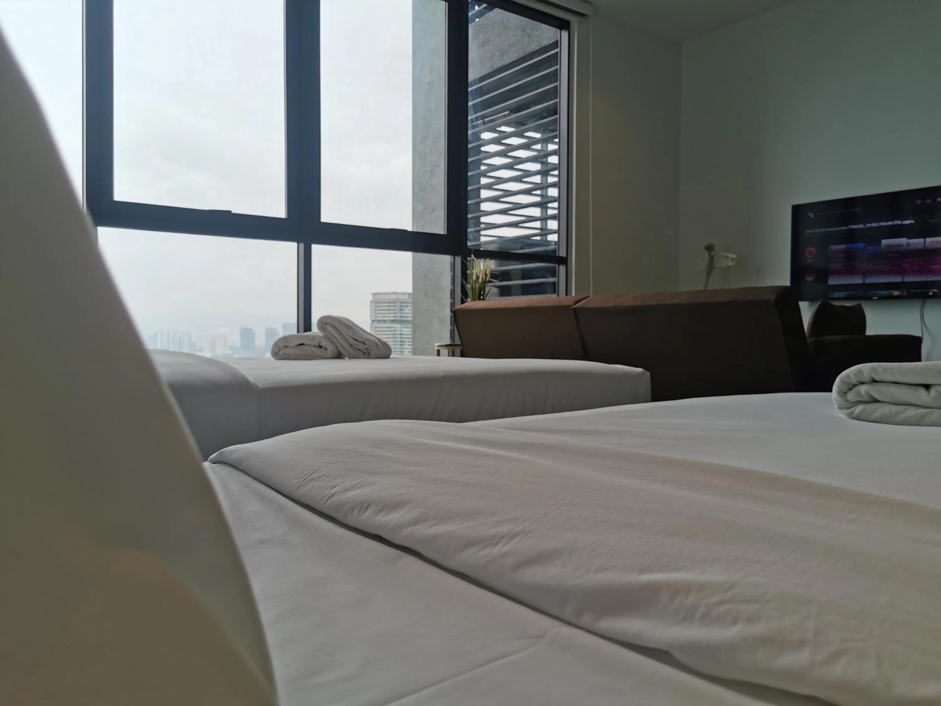 Bed in Scarletz Suites KLCC by De Harlequins Guesthouse