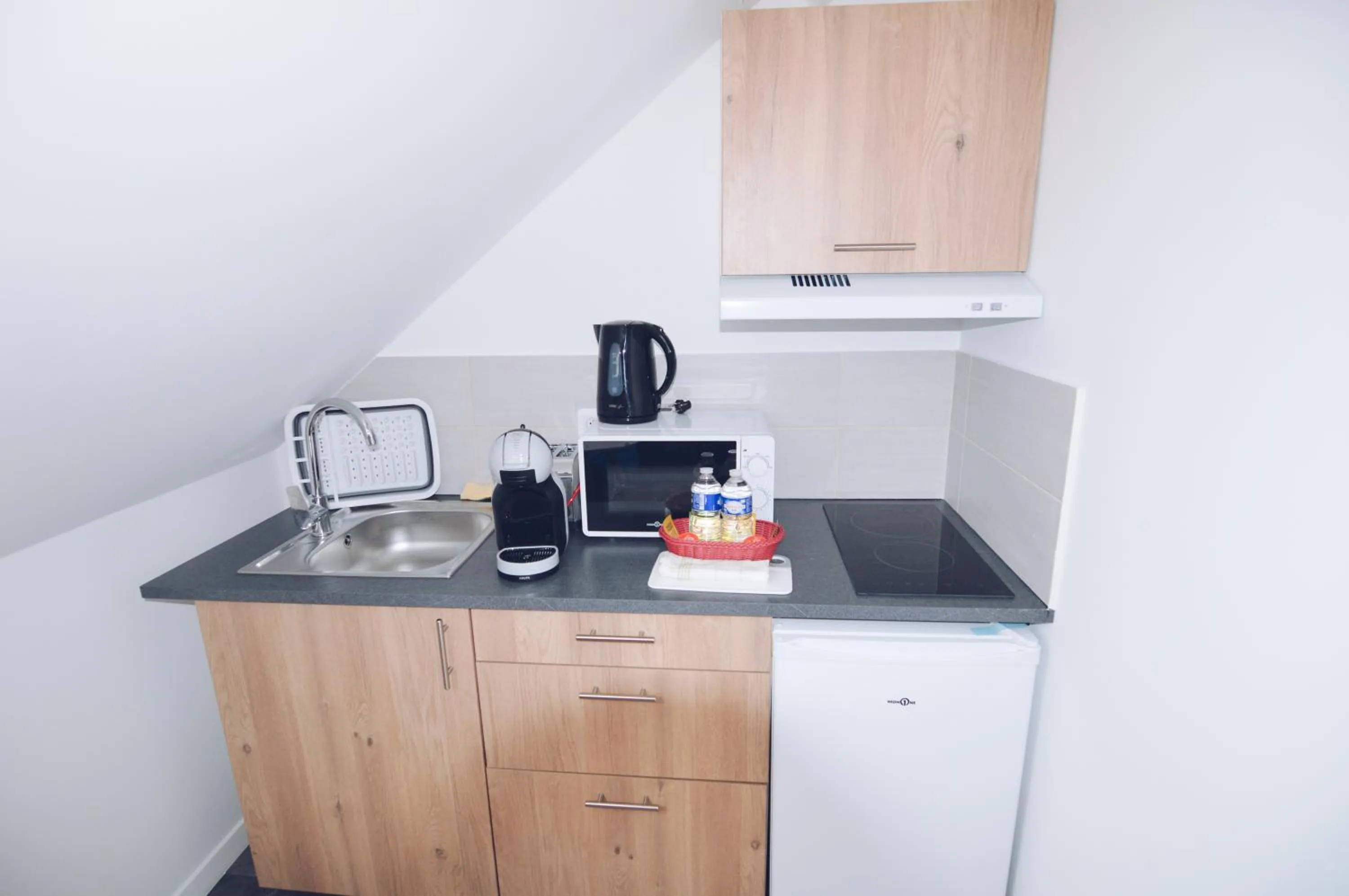 Kitchen or kitchenette in Studios Lsquare Residence AFPA