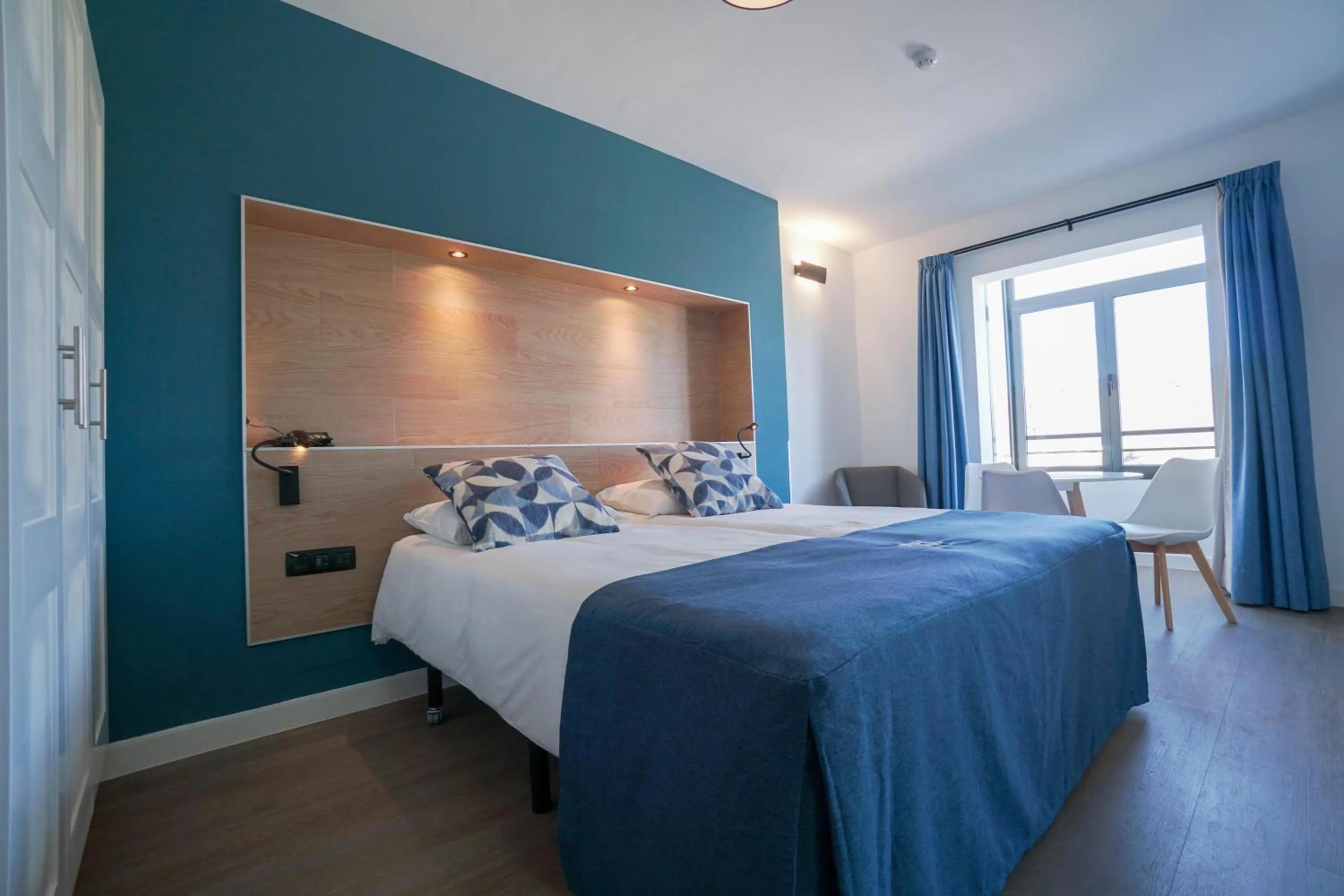 Photo of the whole room, Bed in Playitas Hotel - Sports Resort