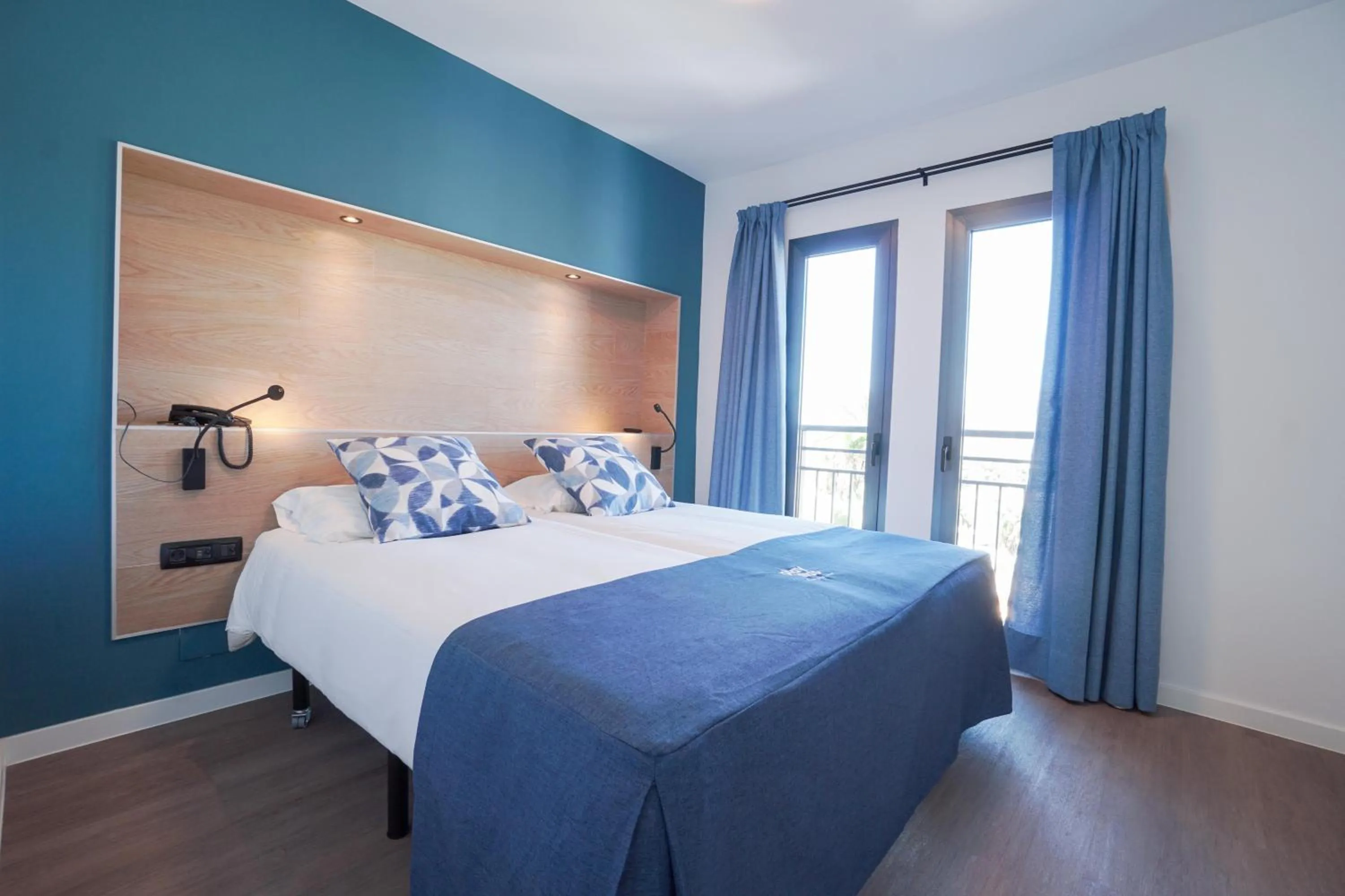 Photo of the whole room, Bed in Playitas Hotel - Sports Resort