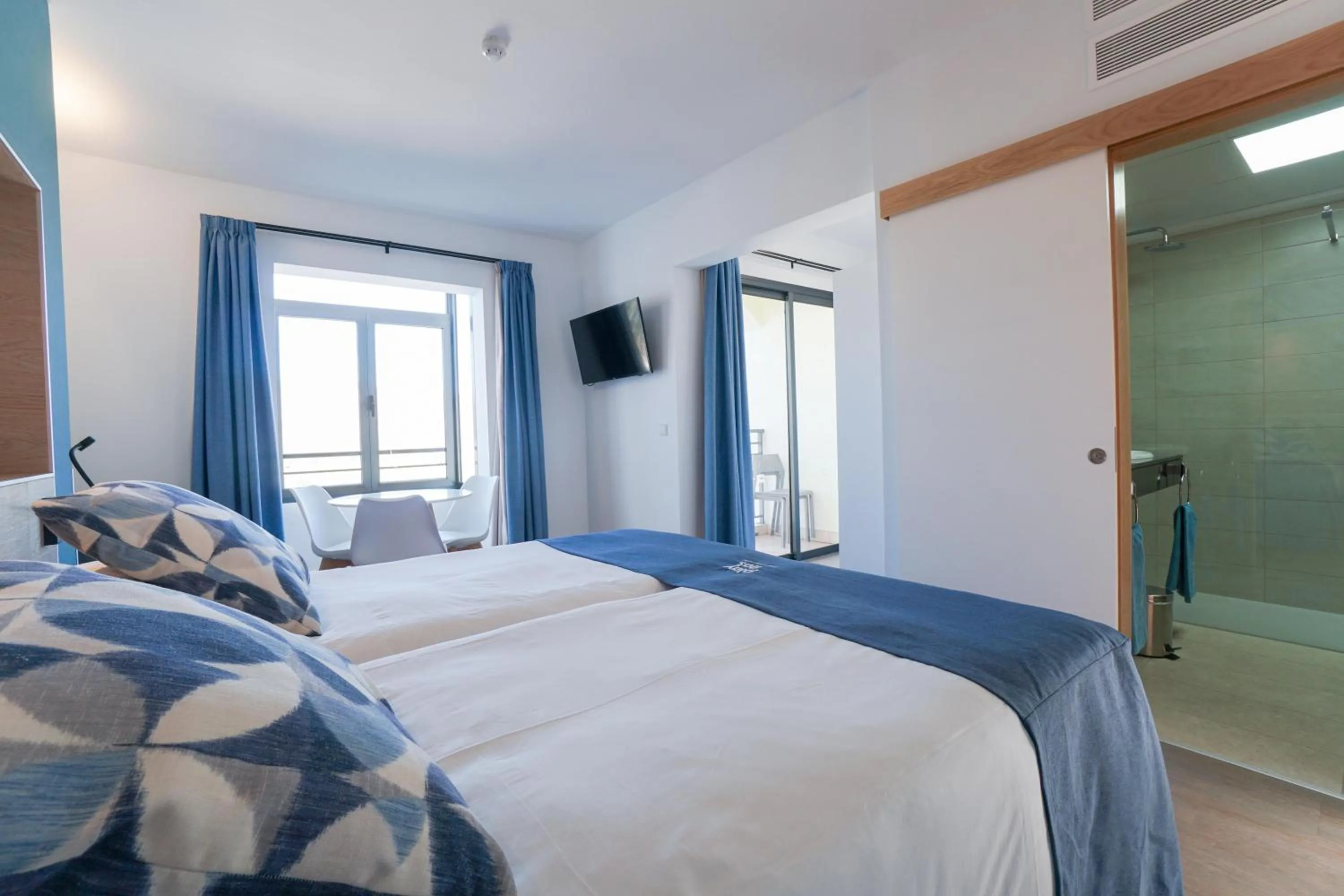 Photo of the whole room, Bed in Playitas Hotel - Sports Resort