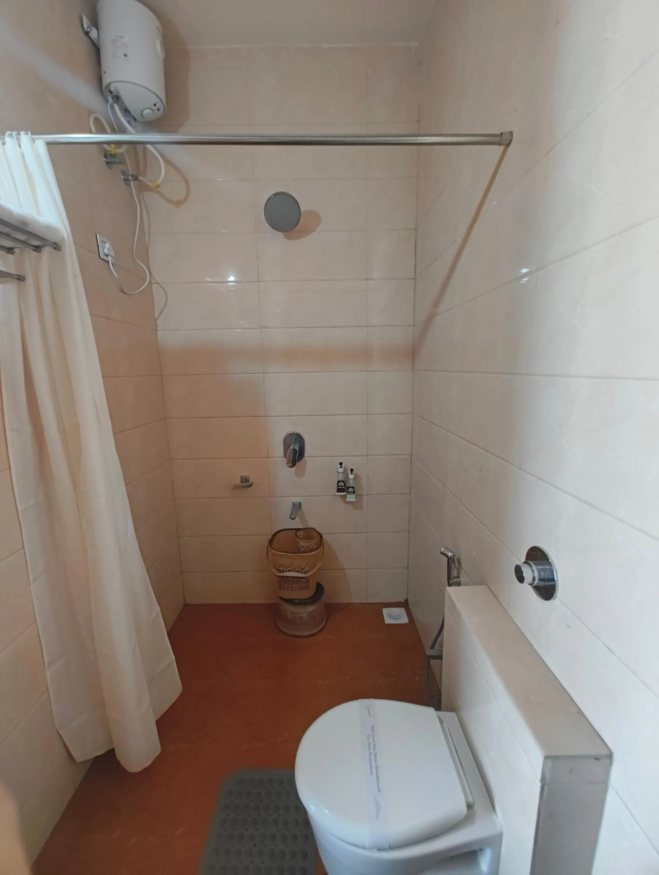 Bathroom in Flamingo Club and Resort Una 3 Km Away from Diu Check Post
