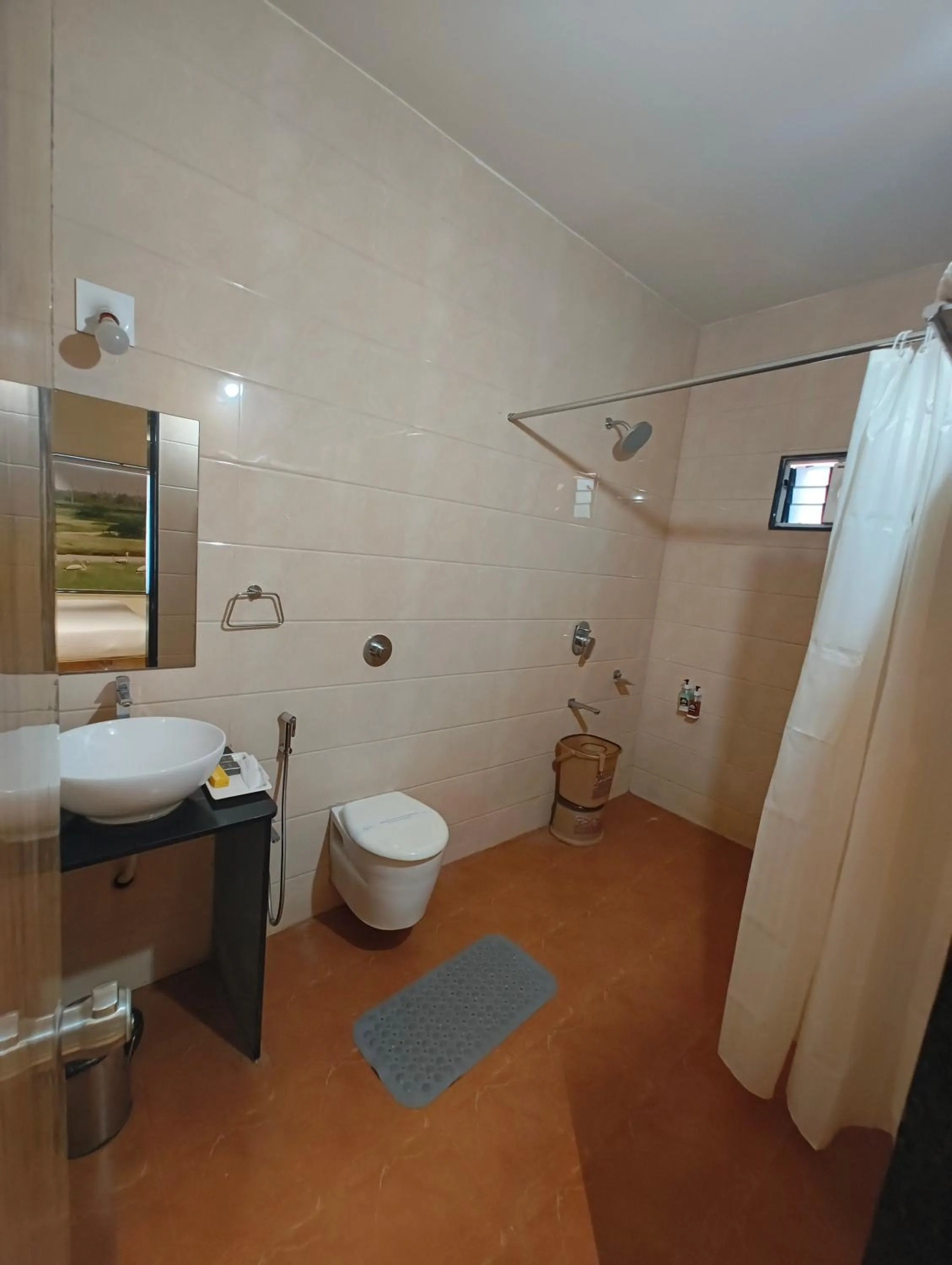 Bathroom in Flamingo Club and Resort Una 3 Km Away from Diu Check Post