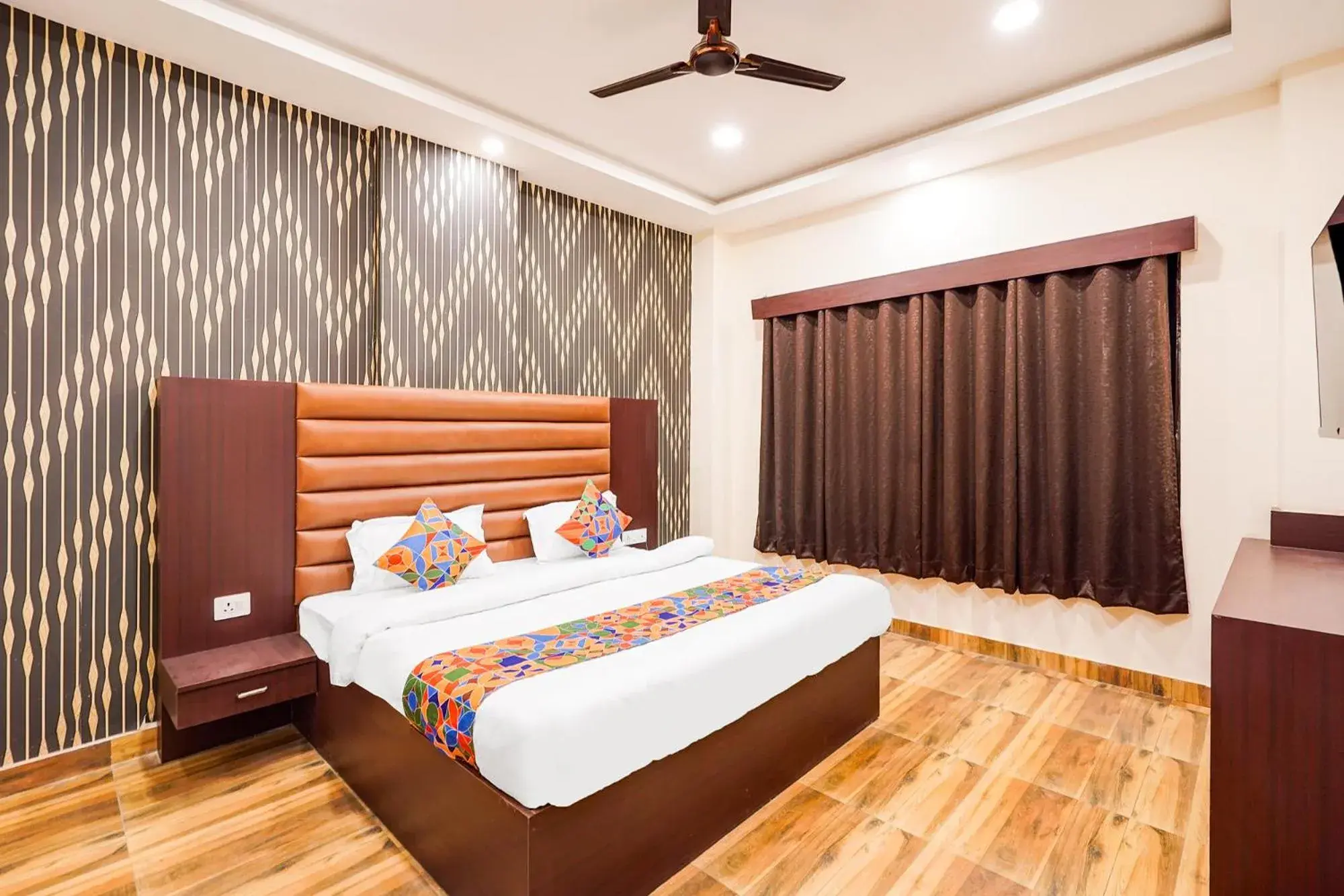 Deluxe Room - single occupancy in FabHotel Palm Bliss Deluxe Room - single occupancy in FabHotel Palm Bliss