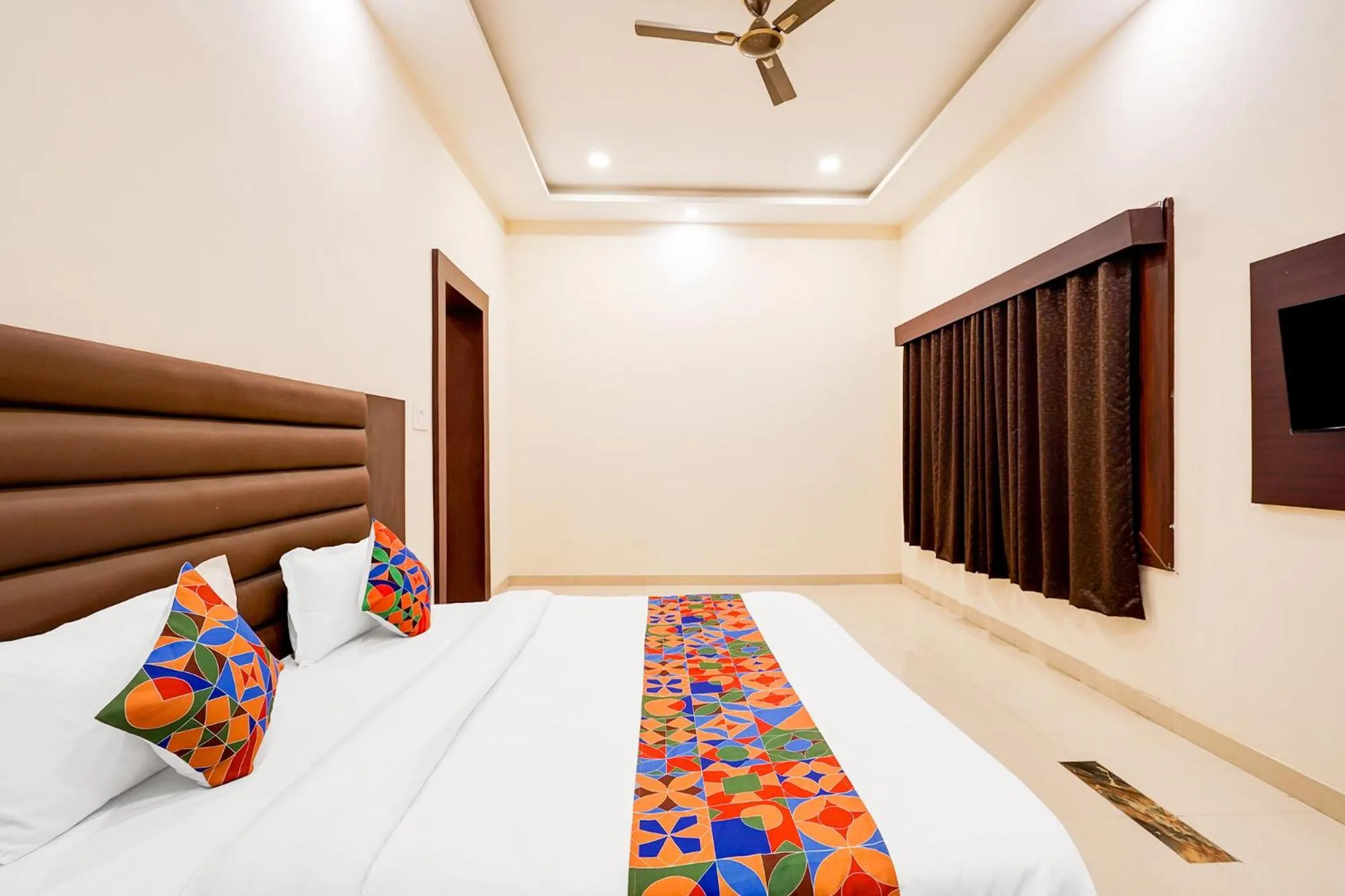 Bed in FabHotel Palm Bliss