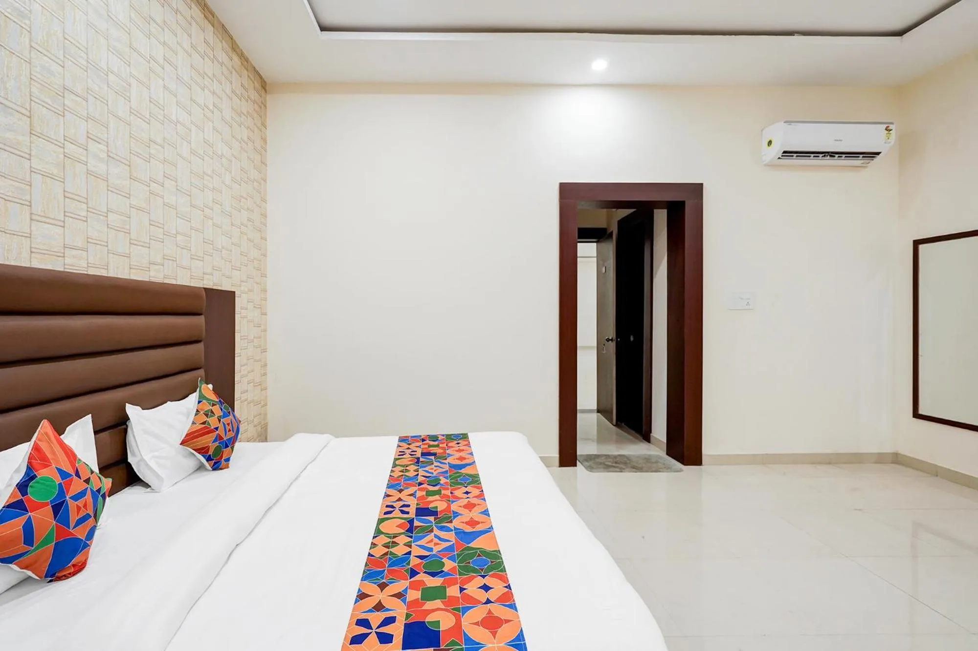 Bed in FabHotel Palm Bliss