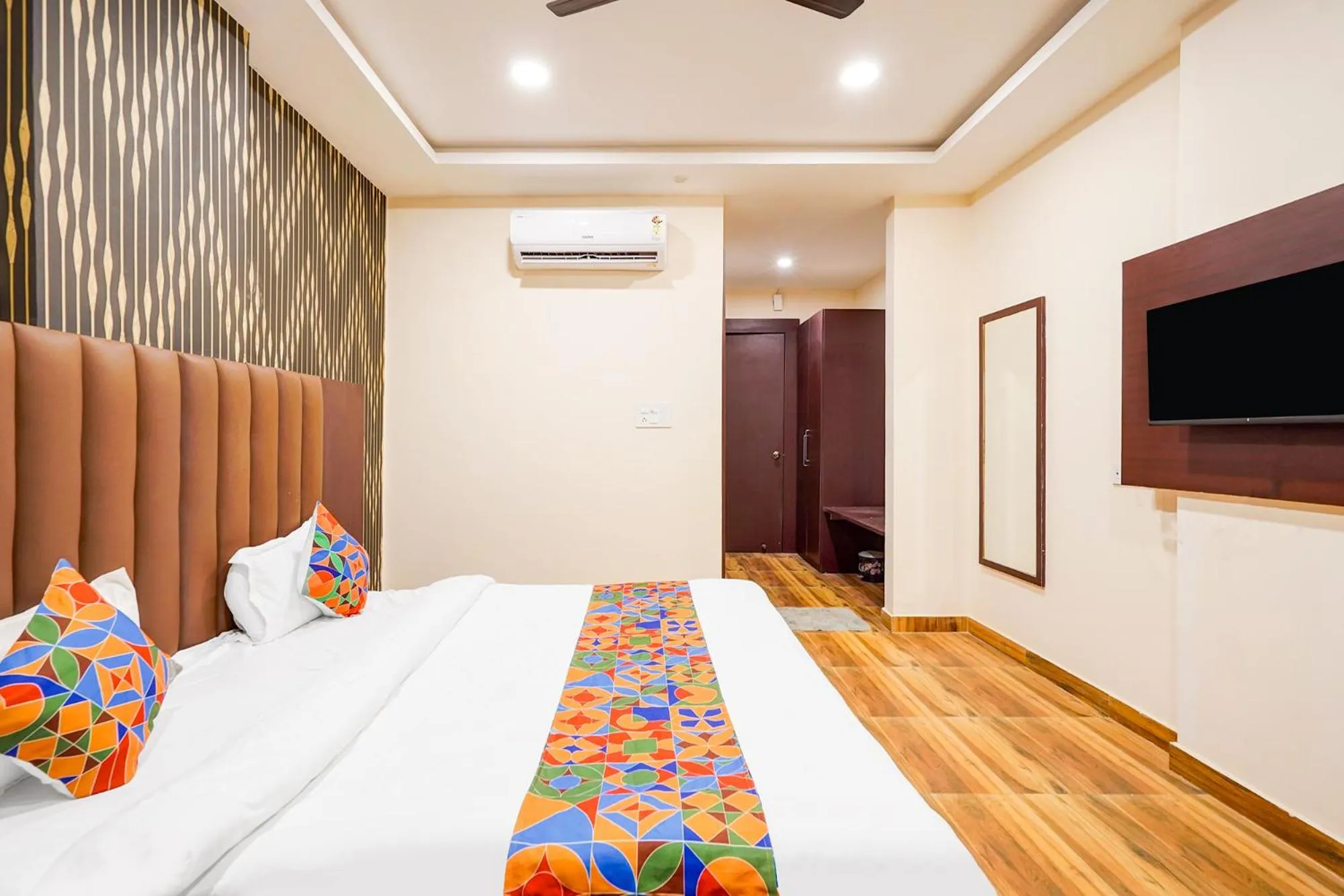 Bed in FabHotel Palm Bliss