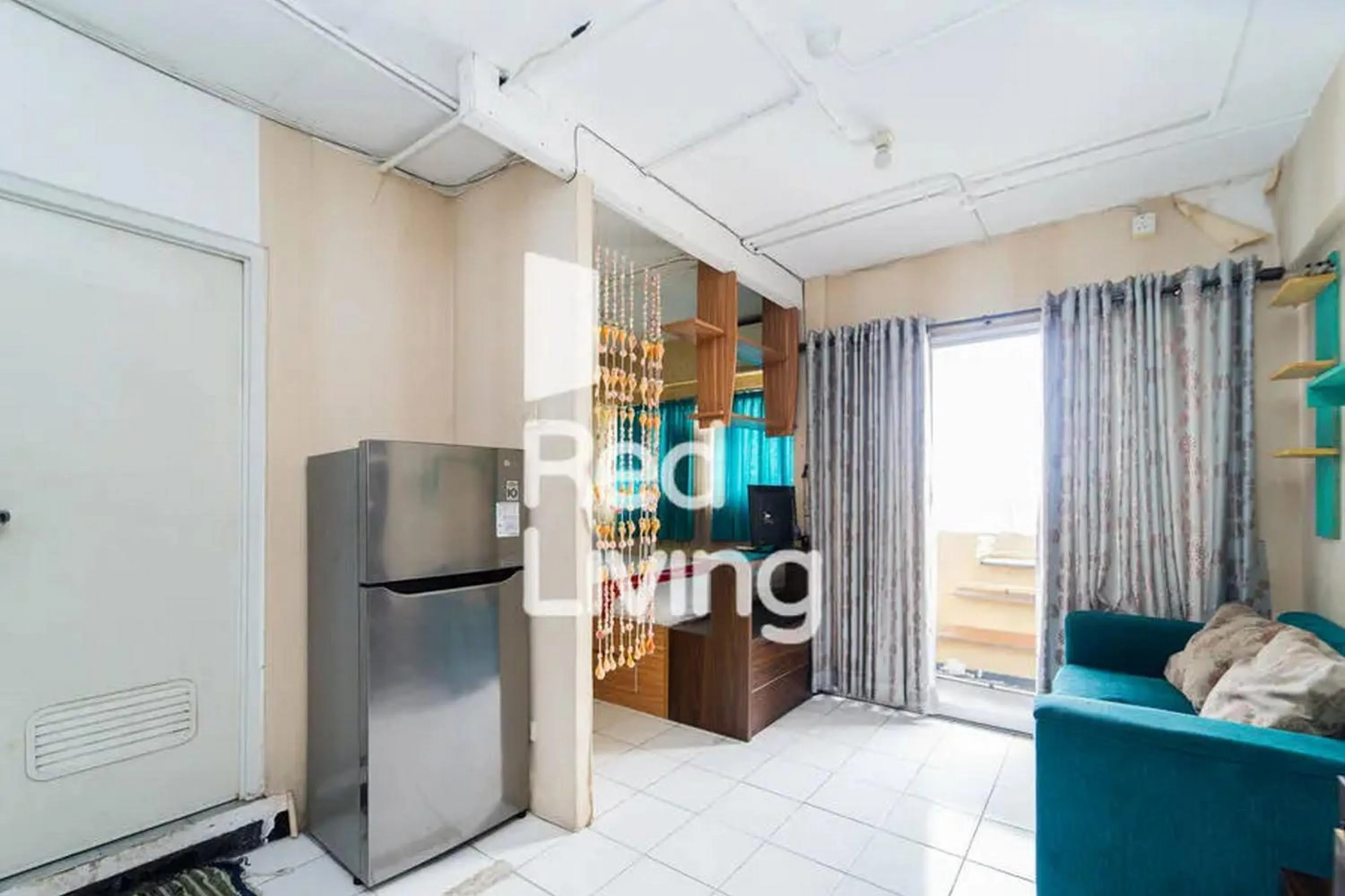 Communal lounge/ TV room in RedLiving Apartemen Sentra Timur Residence - Myroom id Tower Green